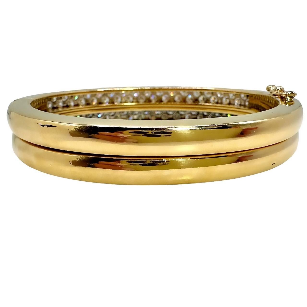 Women's Pair of 14k Yellow Gold Oval Bangles with Pave Diamonds on across the Top For Sale