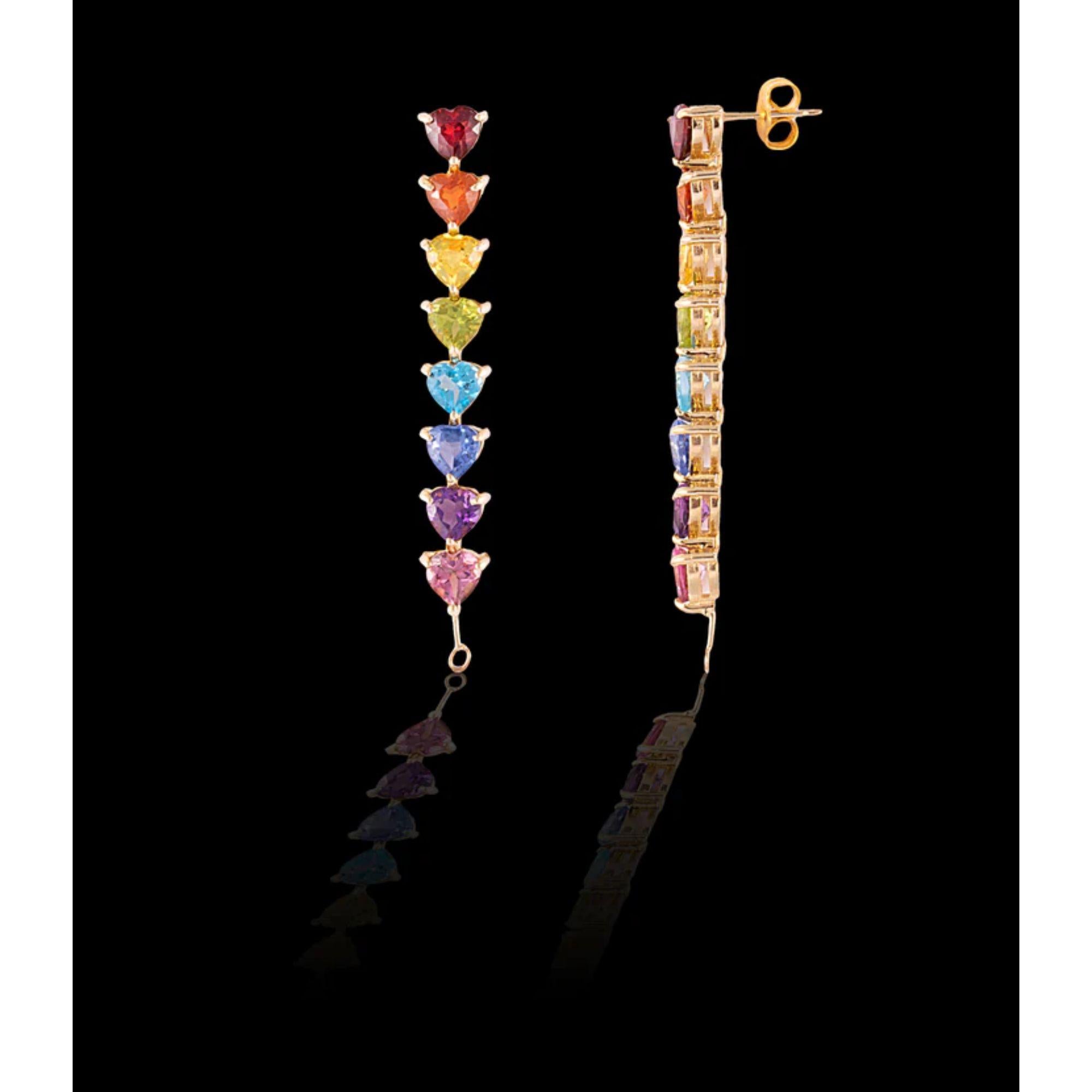 Drip in the full rainbow fantasy in the most unique and colorful drop earrings to light up your neck. These earrings are like no other and consists of heart settings with colored gems and sapphires in the Classic Mordekai rainbow pattern. Goes