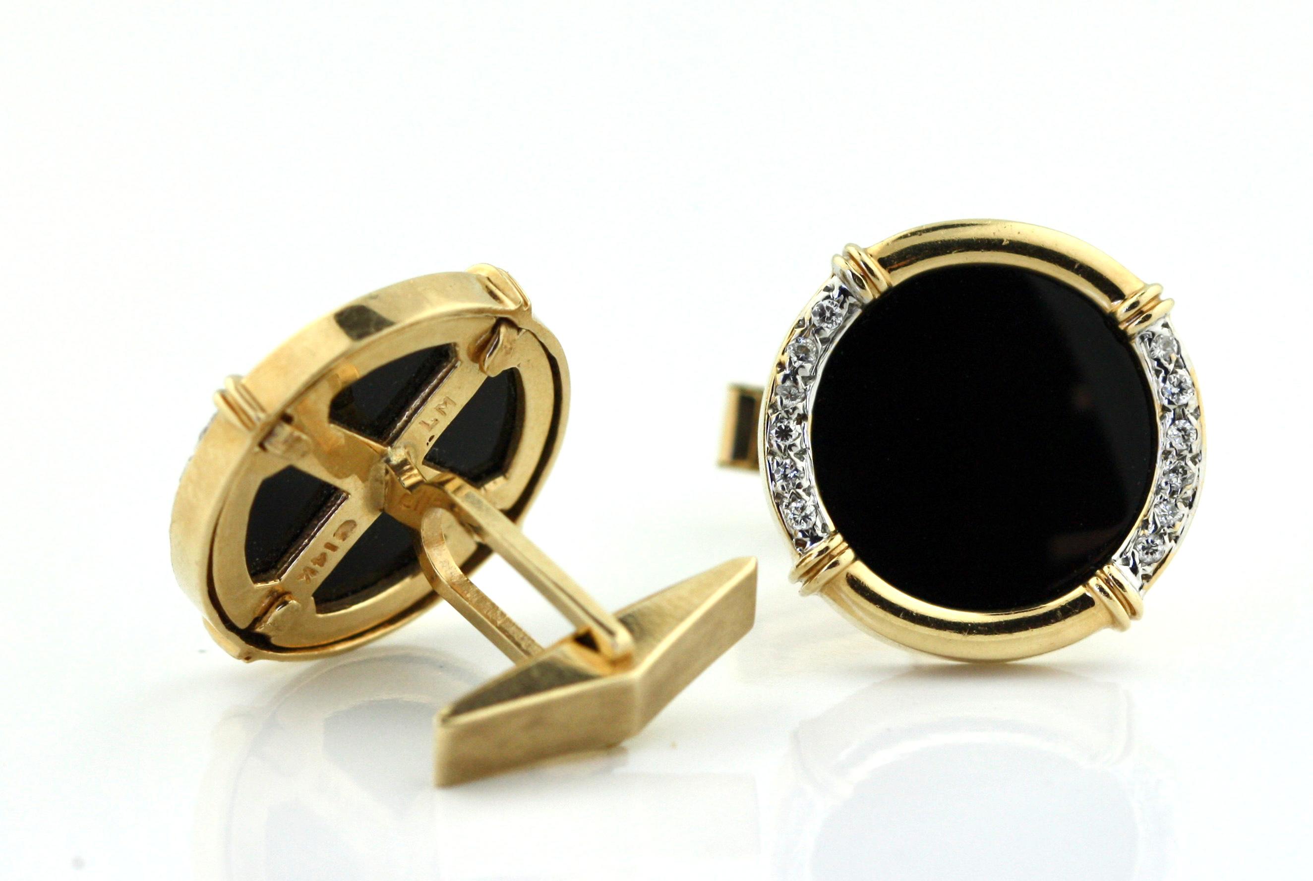 

Pair of 14kt Yellow Gold, Onyx and Diamond Cufflinks
Each of round design set with onyx and diamonds

