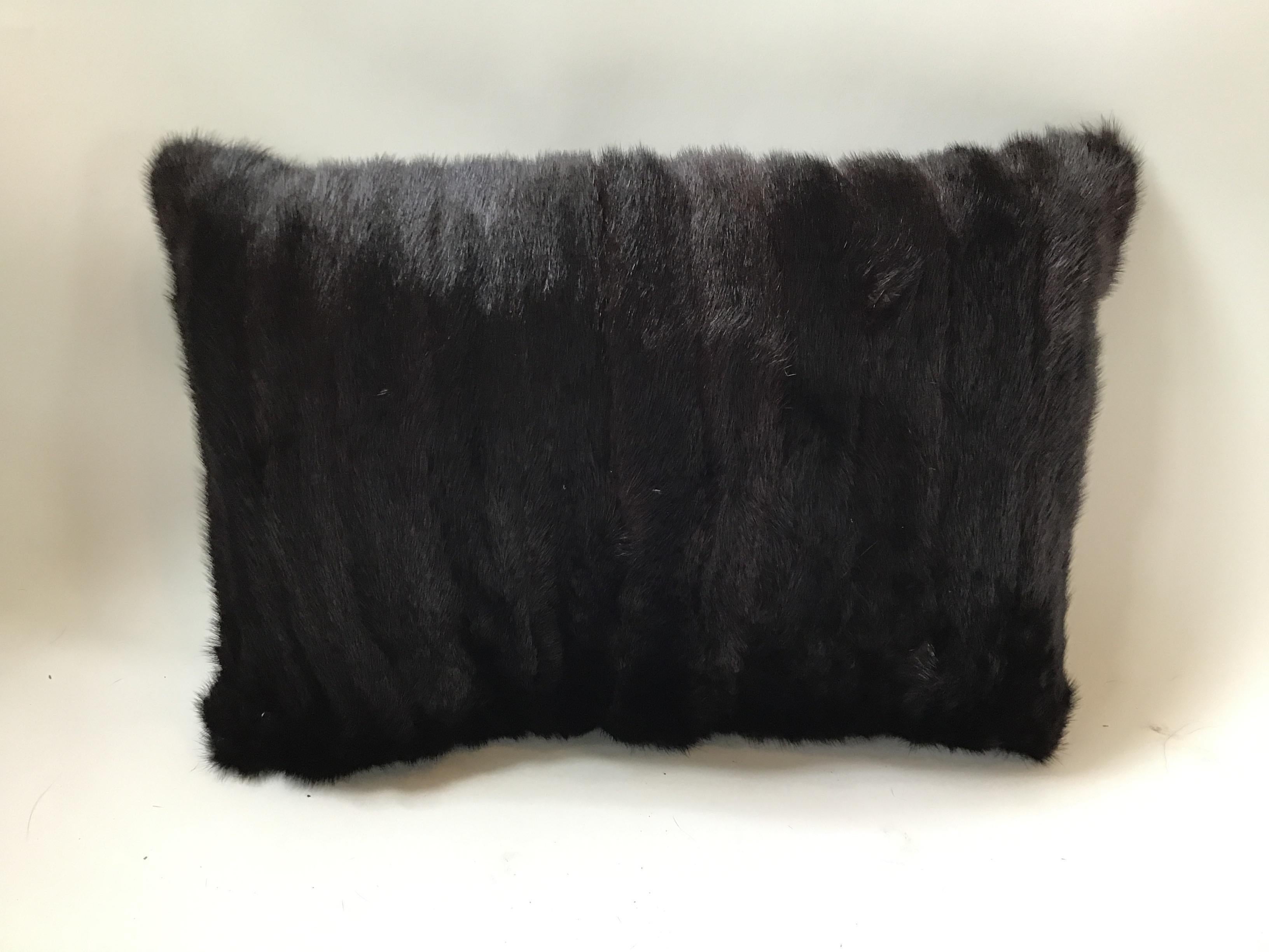 Pair of 14 x 21 mink pillows. Down insert. Zippered pillow.