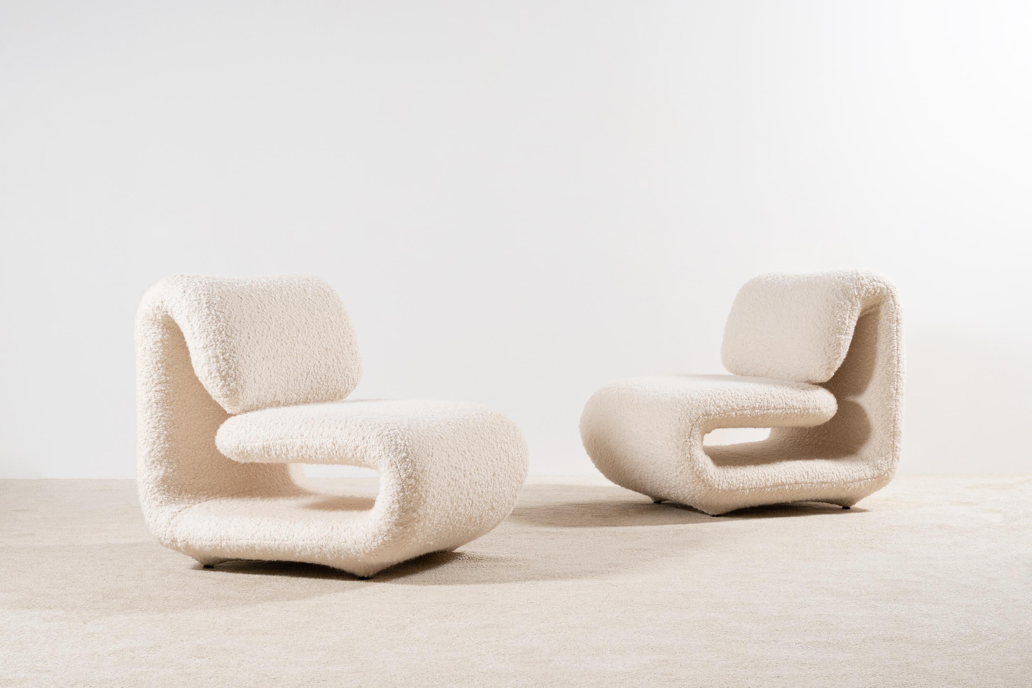 Paire de chaises longues conçues par Etienne-Henri Martin. Modèle 