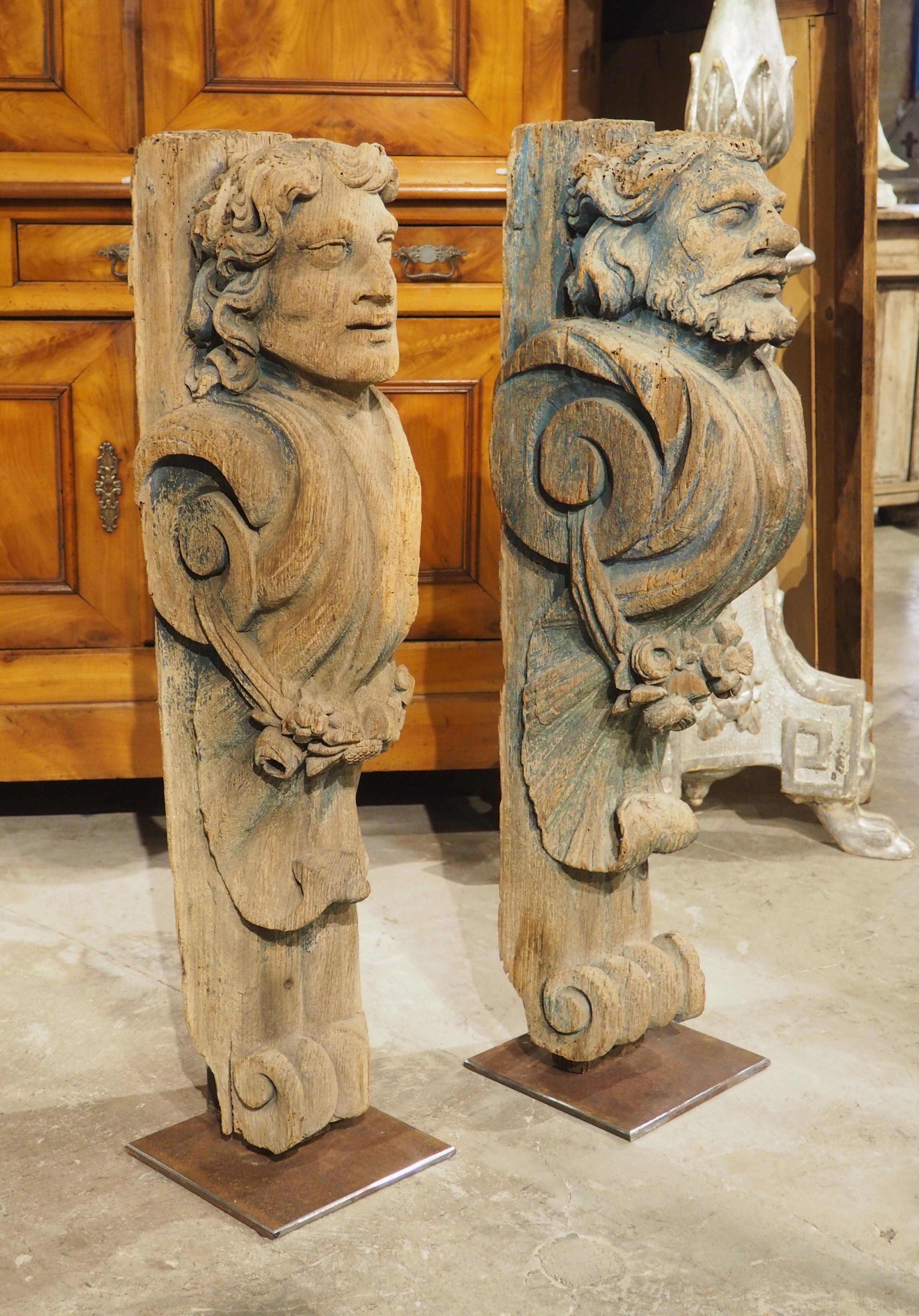 A fascinating bit of history, this pair of carved wooden terms dates to the High Renaissance during the 1500s. A term is a beam support in the form of a human head where the bust continues down as a pillar. Hand-carved in Northern Europe, the