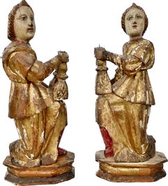 Pair Of 16th Century Italian Giltwood Candle Bearing Angel Candlesticks