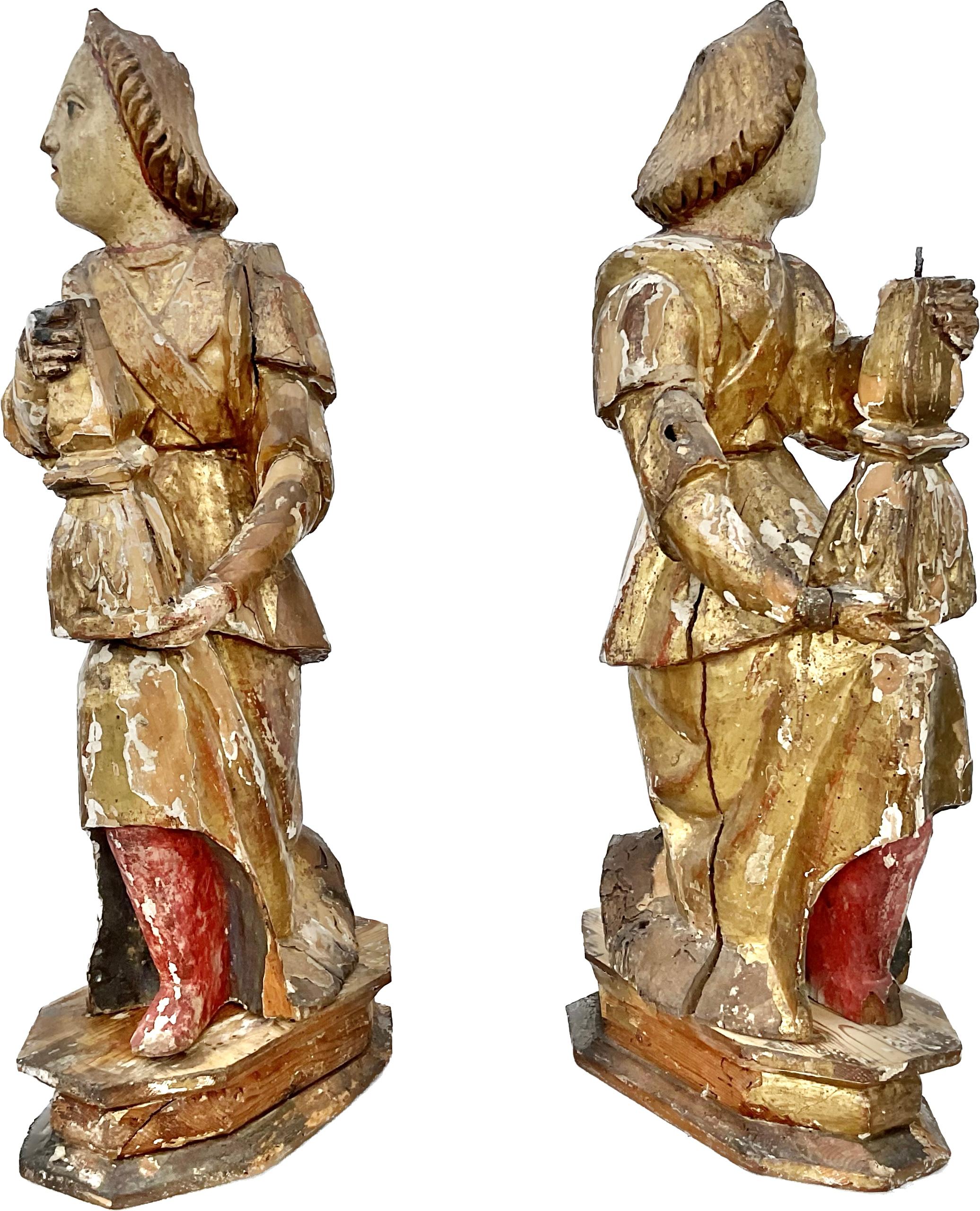 Renaissance Pair Of 16th Century Italian Giltwood Candle Bearing Angel Candlesticks For Sale