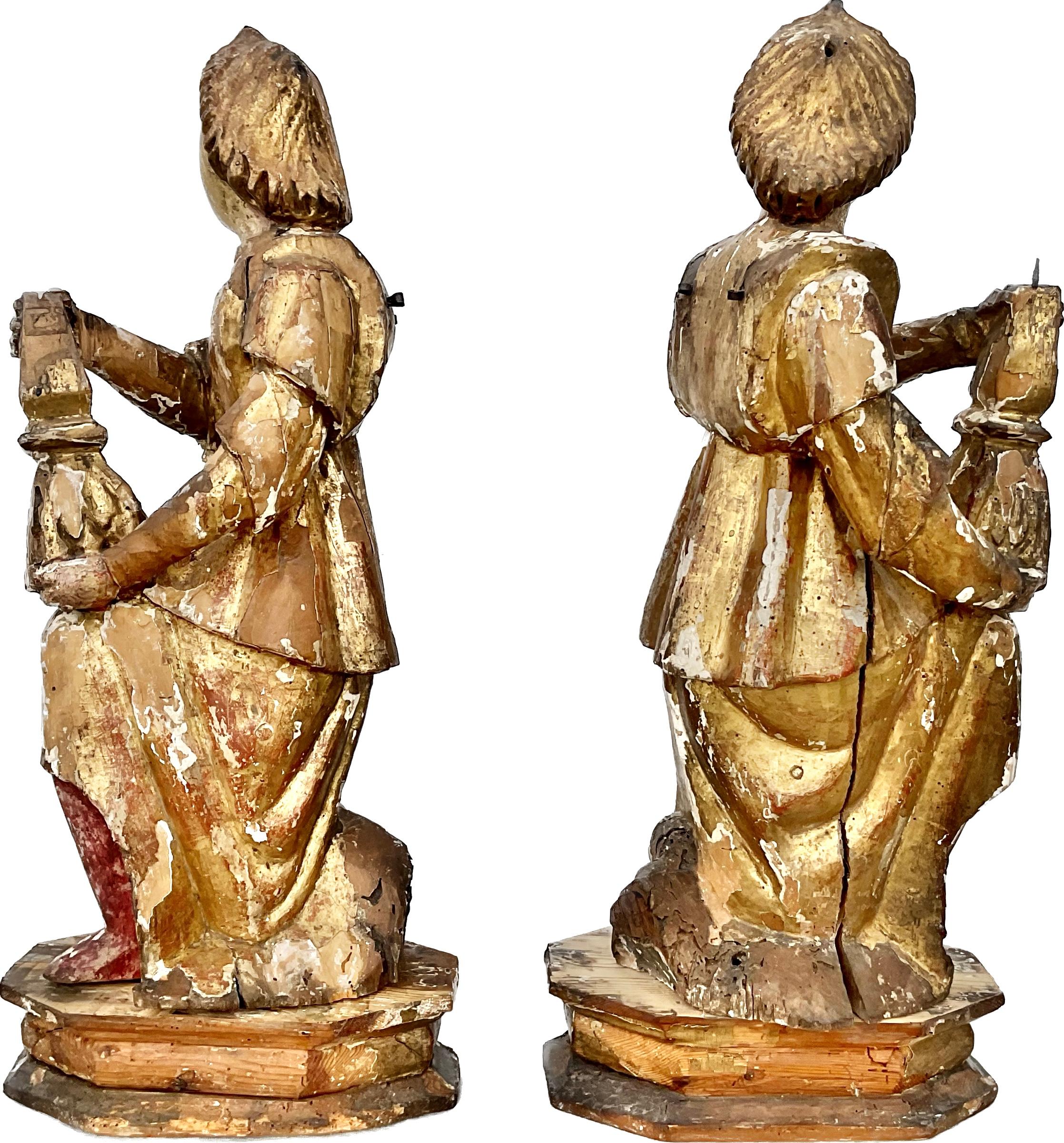 Hand-Carved Pair Of 16th Century Italian Giltwood Candle Bearing Angel Candlesticks For Sale