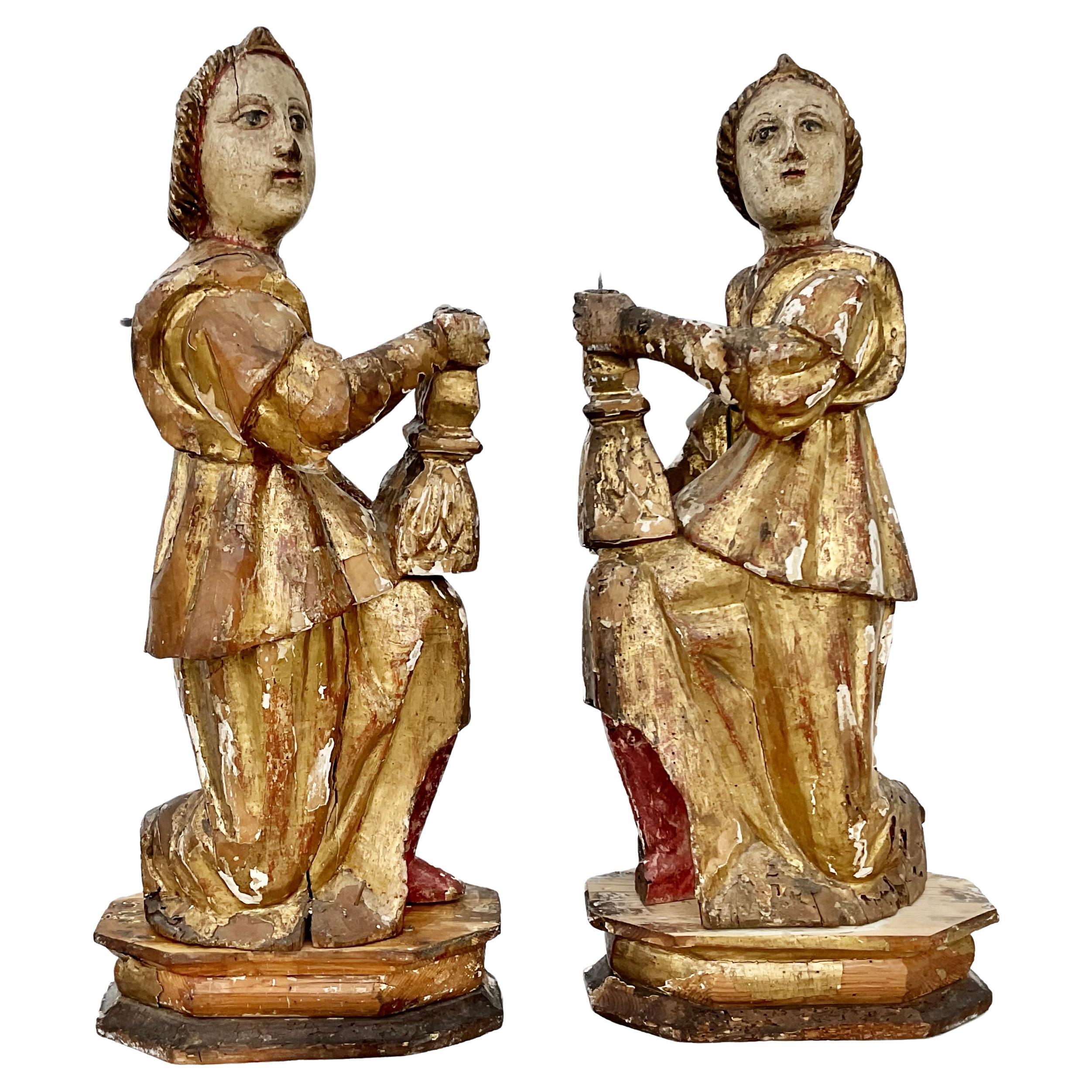 Pair Of 16th Century Italian Giltwood Candle Bearing Angel Candlesticks For Sale