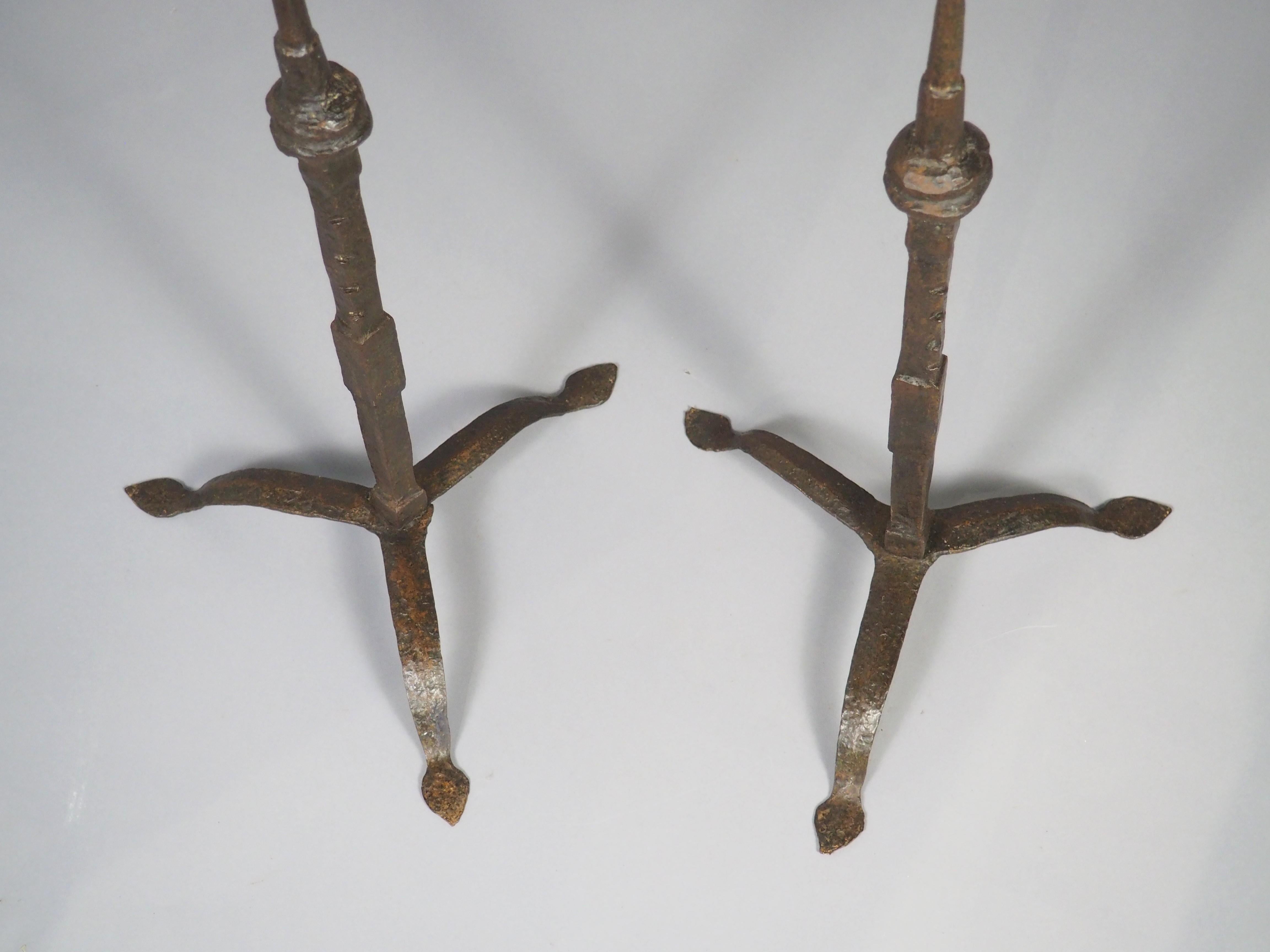 More information coming soon…

Forged in Italy during the late 1500s or early 1600s, this pair of tripod prickets once served as candlesticks.  Most modern collectors will utilize these as decorative accessories for a table, console, or fireplace