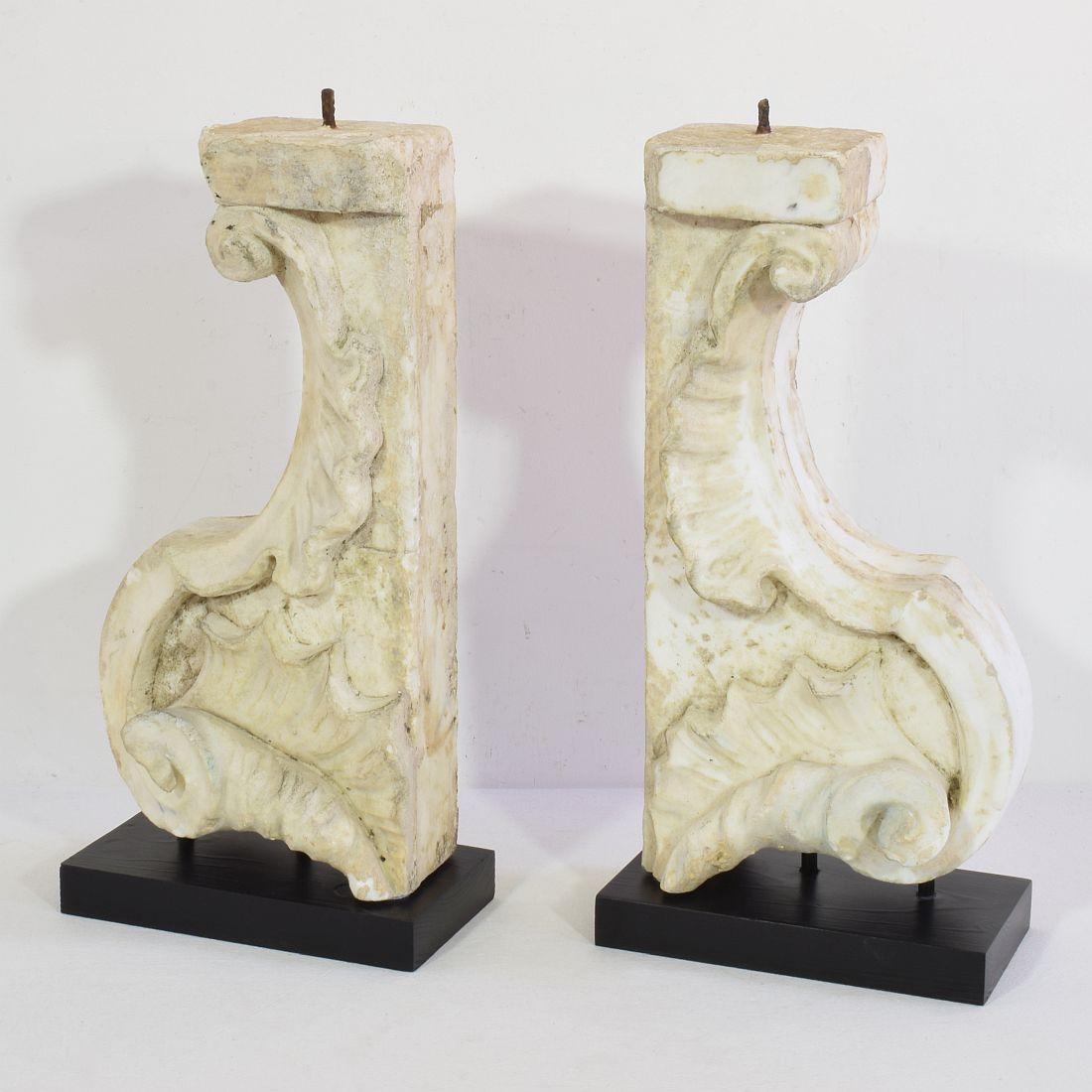 Unique and very beautiful pair weathered white marble baroque ornaments. They most likely once adorned a church altar.
Original period pieces, Italy, circa 1650-1750. Weathered and small losses. 
Measurement is individual.