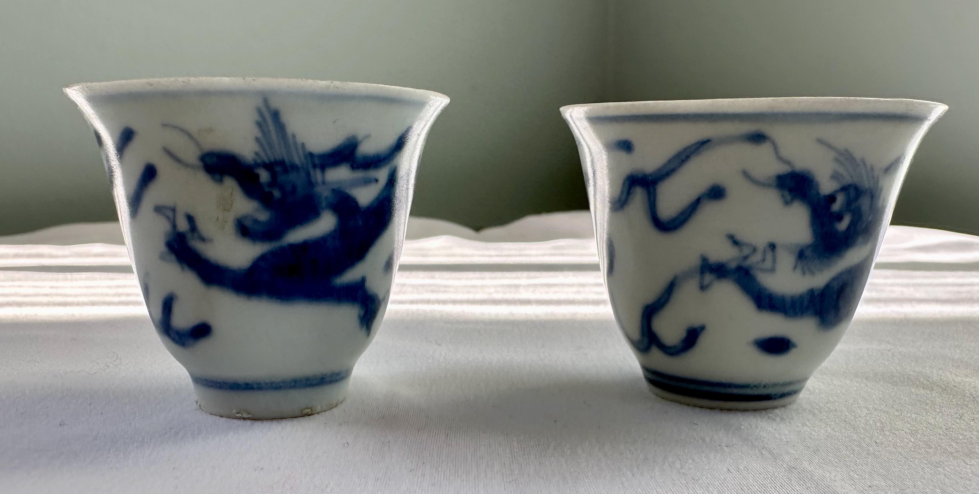 Hand-Painted Pair of 17th Century blue and white dragon wine cups from Hatcher Collection For Sale