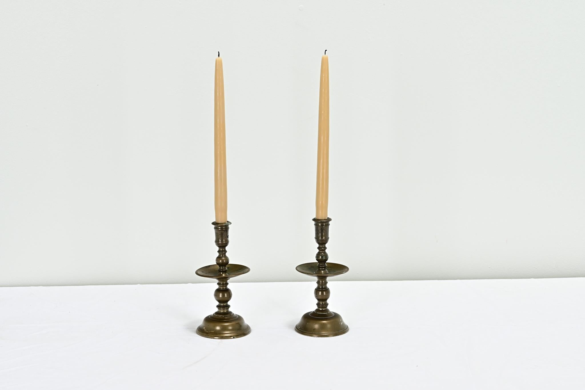 Cast Pair of 17th Century Brass Candlesticks For Sale