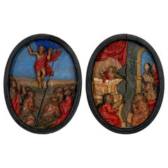 Pair of 17th Century Carved and Painted Oval Religious Plaques