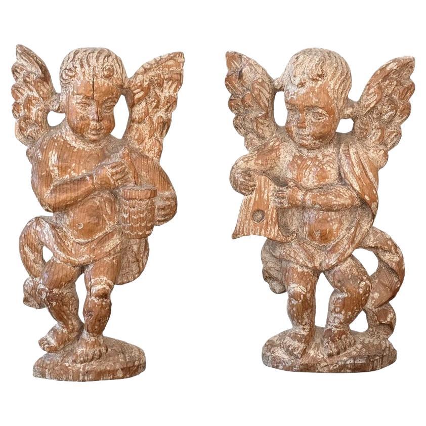 Pair of 17th Century Carved Cherubs on Stands