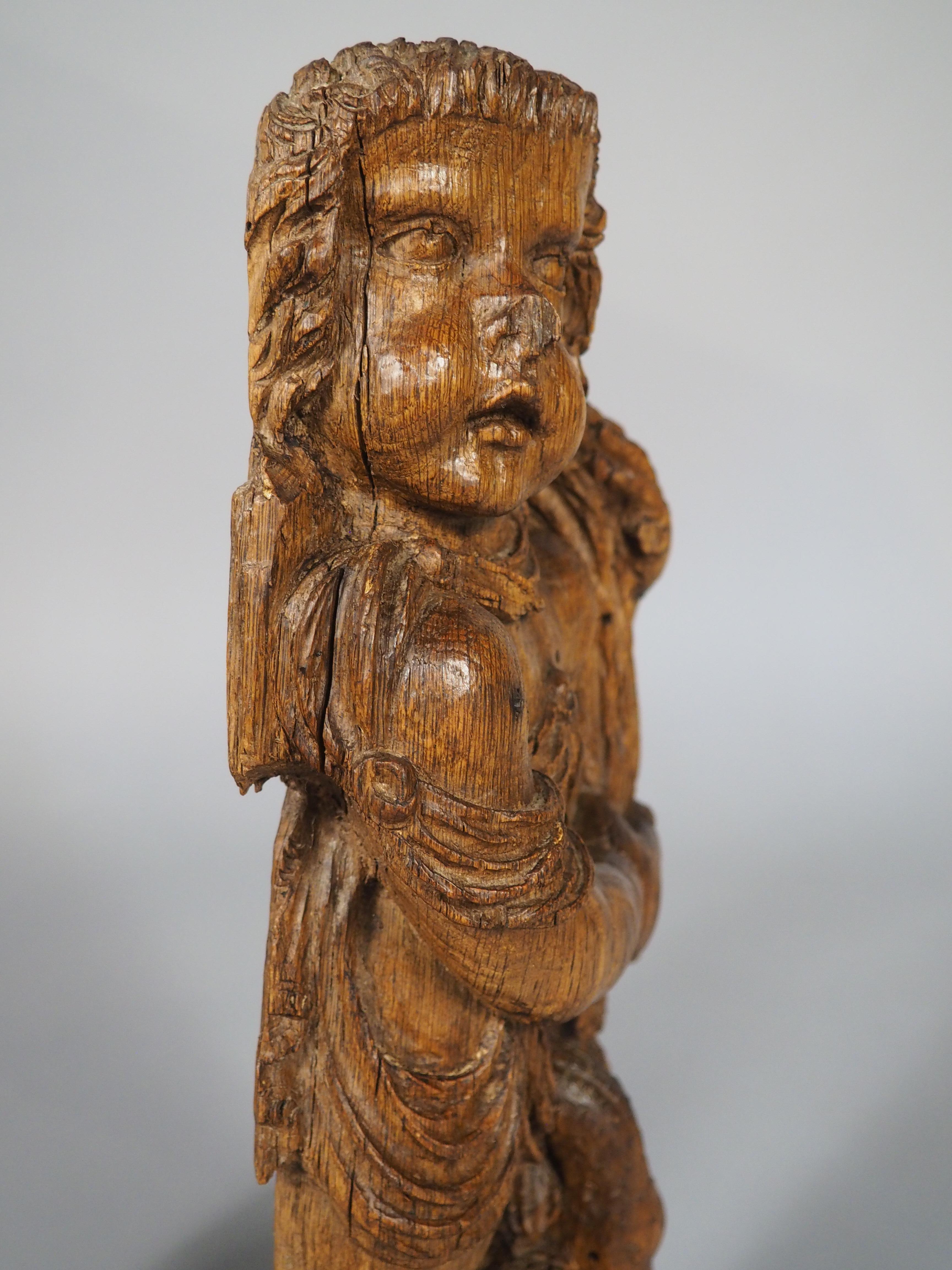 Coppia di sculture di putti fiamminghi del XVII secolo su supporti in ferro contemporanei in vendita 8