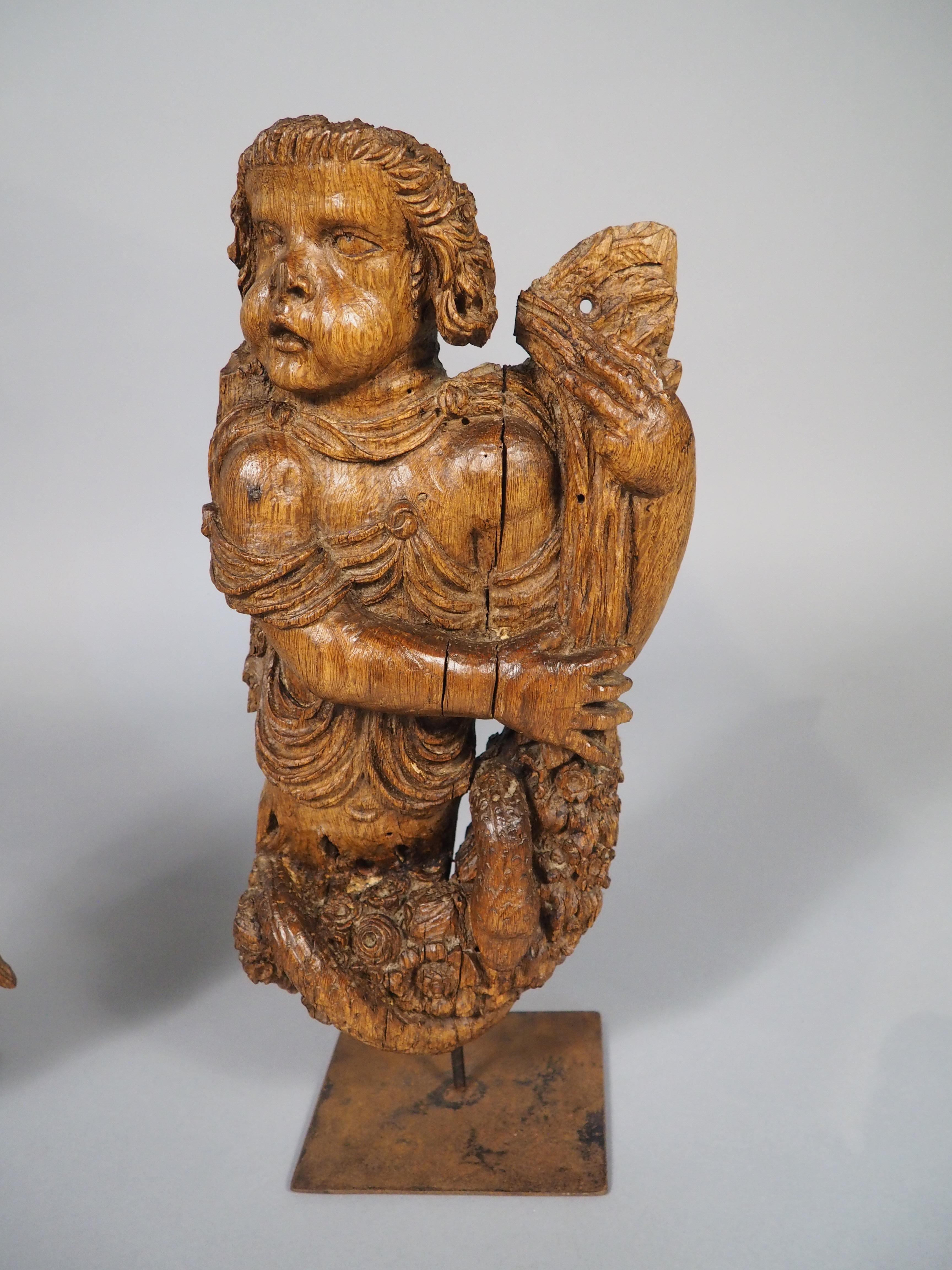 Coppia di sculture di putti fiamminghi del XVII secolo su supporti in ferro contemporanei In condizioni buone in vendita a Dallas, TX