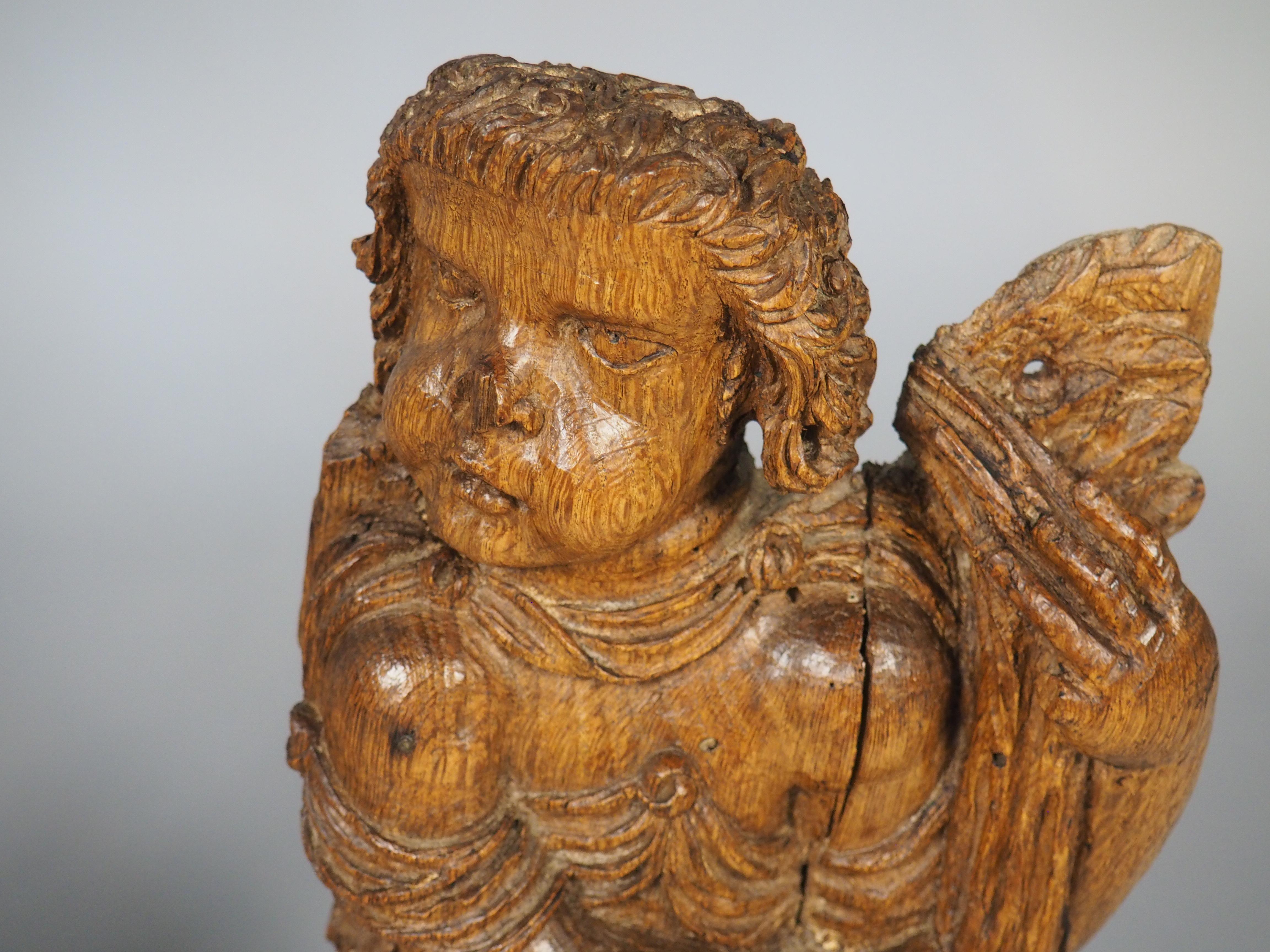 Metallo Coppia di sculture di putti fiamminghi del XVII secolo su supporti in ferro contemporanei in vendita