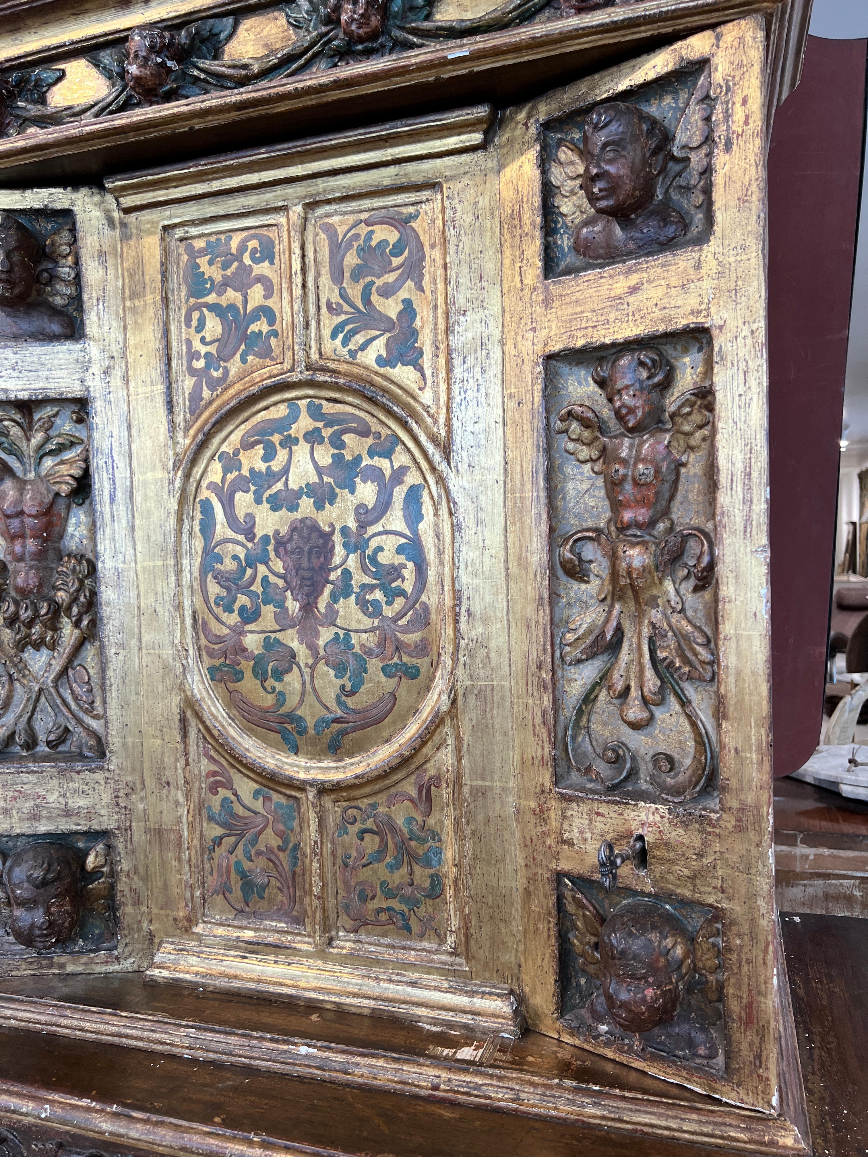 The wow factor is enormous with these matching double chests.  They have extremely ornate carving and painting galore over every surface.  