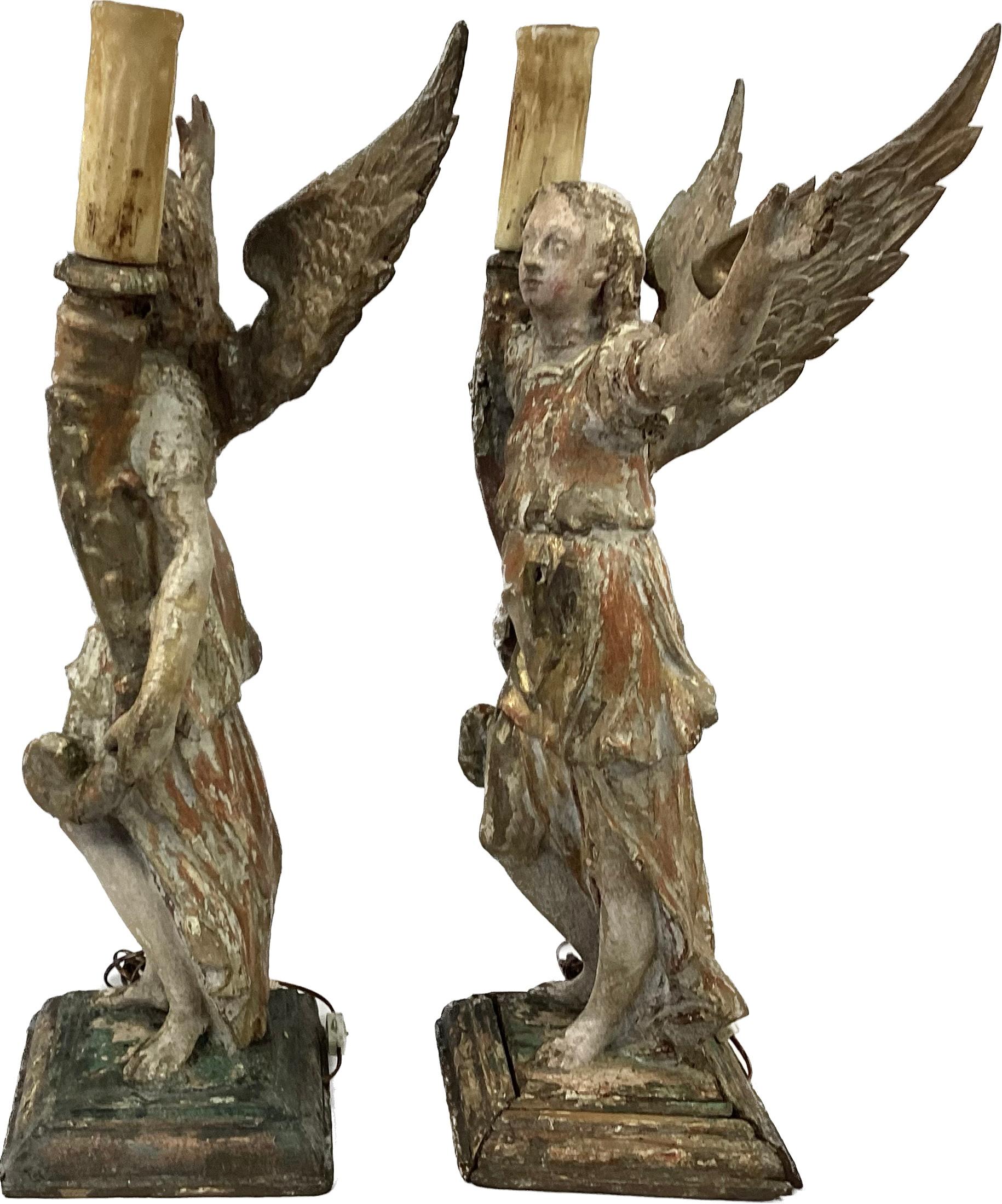18th Century and Earlier Pair of 17th Century Giltwood Italian Candle- Bearing Angel Lamps
