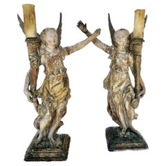 Pair of 17th Century Giltwood Italian Candle- Bearing Angel Lamps