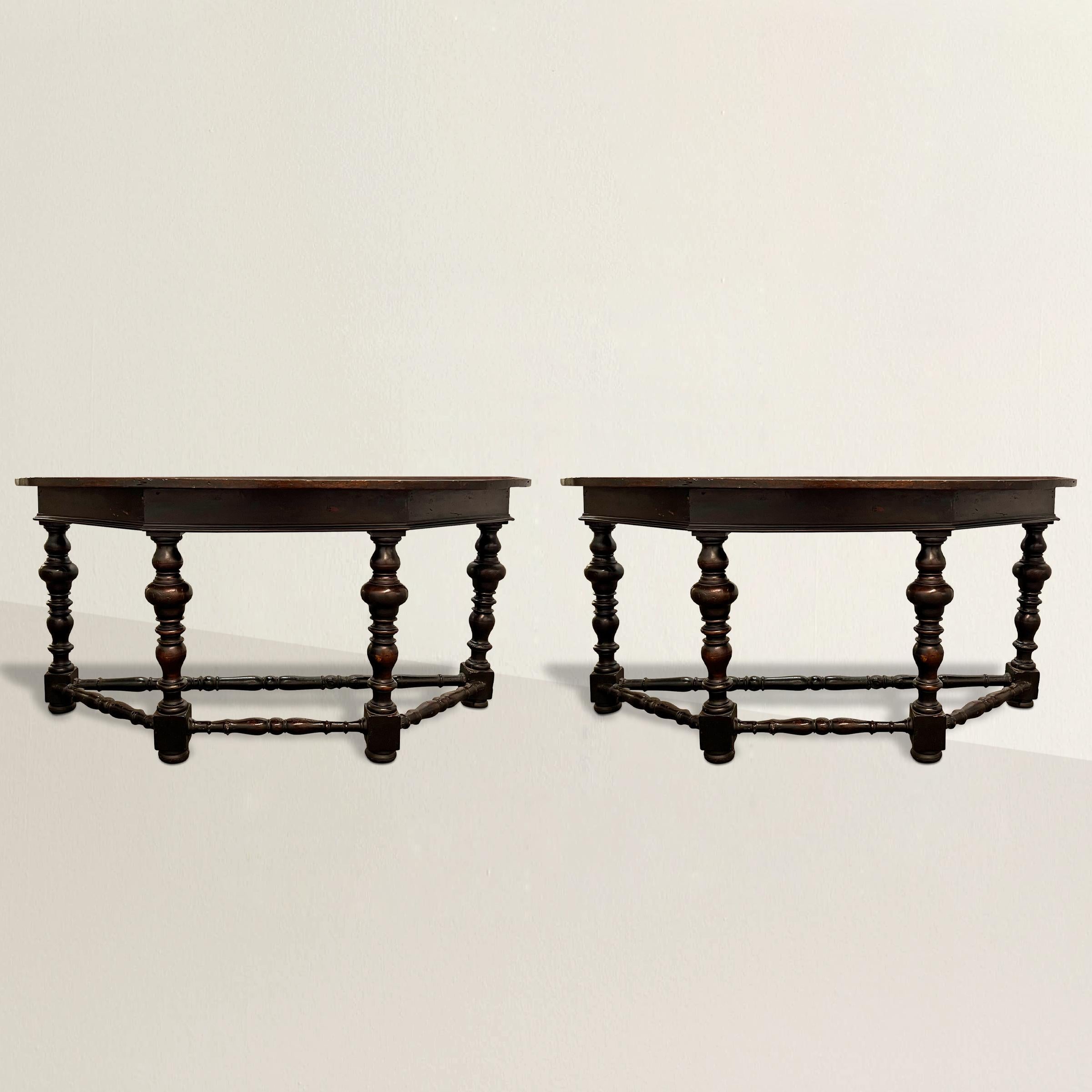 Transport yourself to the opulent elegance of 17th century Northern Italy with this exquisite pair of walnut demi-lune console tables. These remarkable pieces embody the defining characteristics of Northern Italian furniture design during this