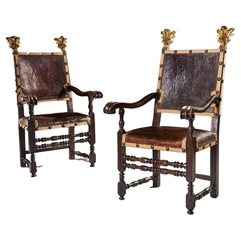 Pair of 17th Century Italian Baroque Parcel-Gilt Walnut Leather Armchairs For Sale