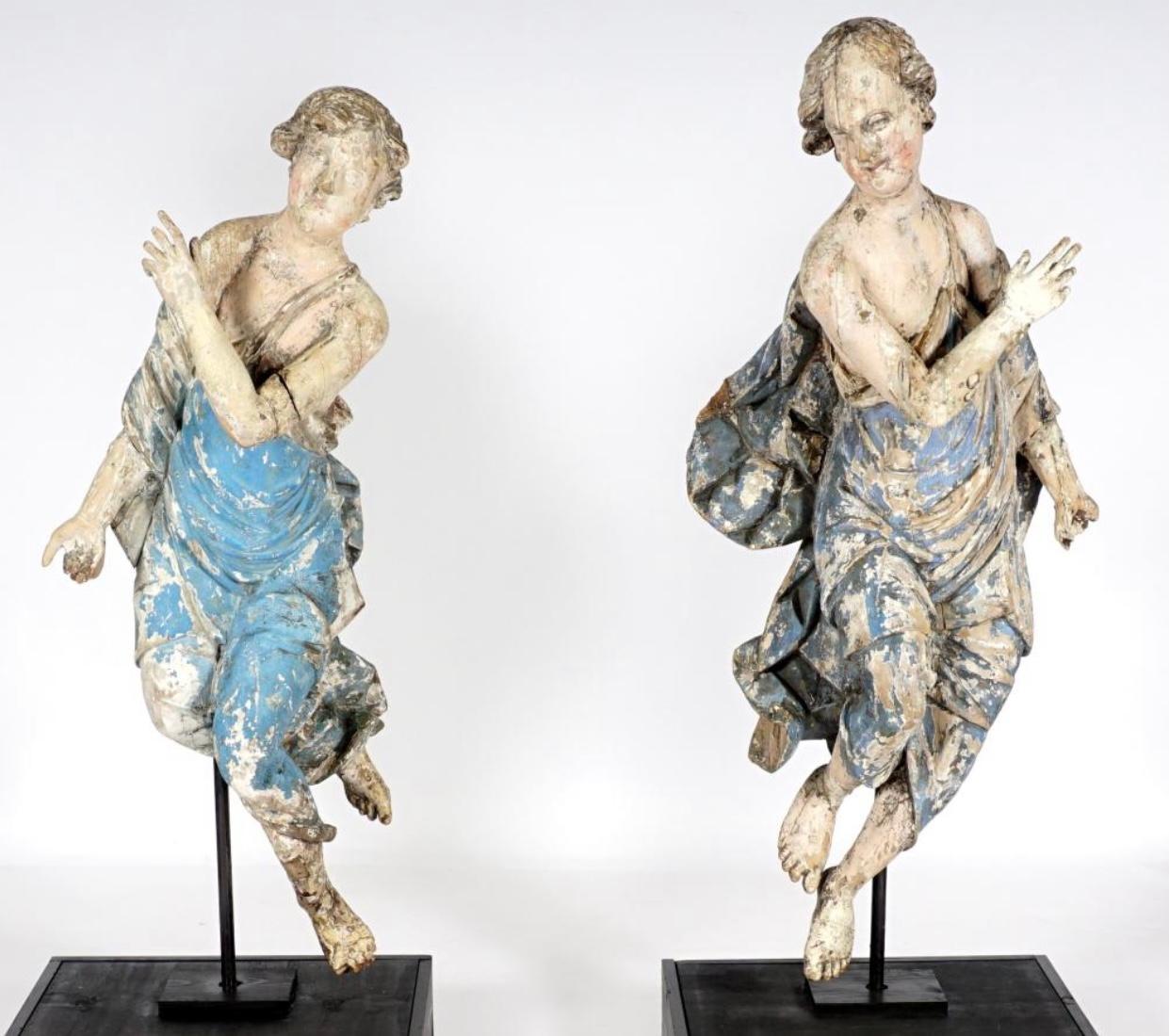 Pair of Late 17th/Early 18th Century carved and polychrome Italian angel figures. Now mounted in modern stands. Wonderful baroque carving and retain original paint

  