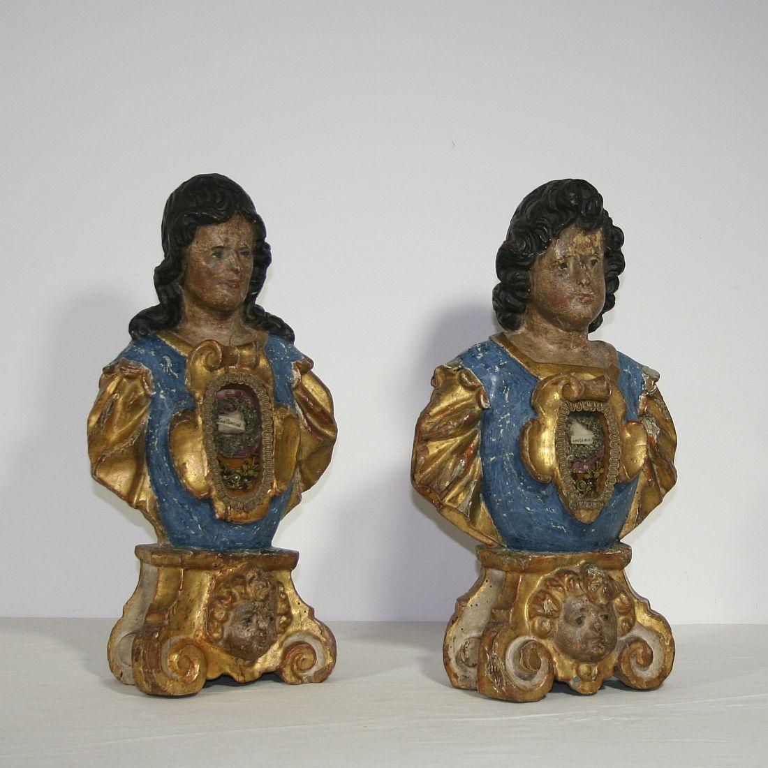 Complete unique set of two early Baroque reliquary busts with their beautiful color and gilding. Beautiful eyecatcher, Italy, circa 1650-1700
Weathered, losses and old repairs.









 