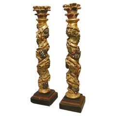 Pair of 17th Century Italian Giltwood and Polychrome Grape Leaf Table Columns