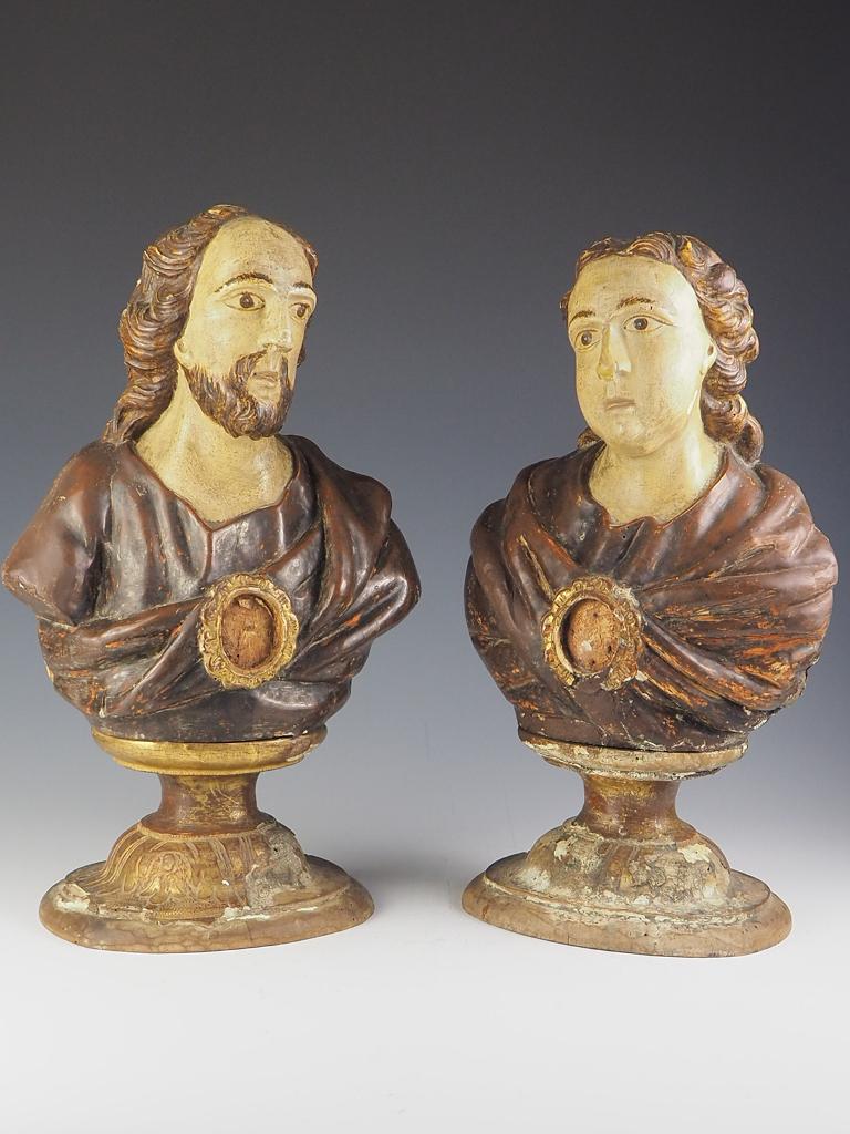 Pair of painted carved wood and gesso, Italian, late 17th century, reliquary busts.