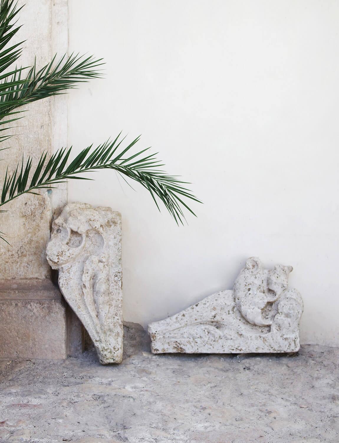 A pair of 300 year old travertine mantles salvaged from a 17th century church in Le Marche. The stone is absolutely beautiful and the pieces have aged allowing for us still to see the intricate carvings that once were. These mantles were likely used