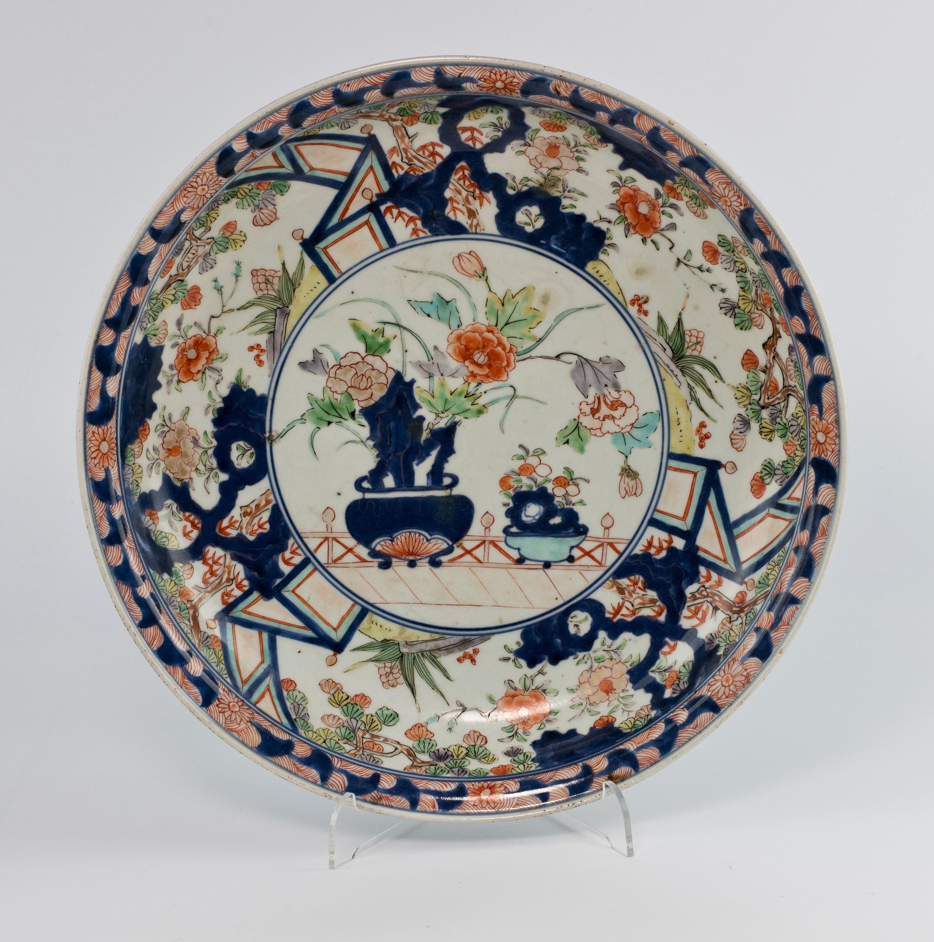 As part of our Japanese works of art collection we are delighted to offer this fine pair of Edo Period 1612-1868, manufactured in the Arita kilns during the Genroku Period 1688-1704, the dishes are painted in typical Imari palette with the