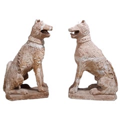 Pair of 17th Century Style Seated Dogs / Armorial Hounds