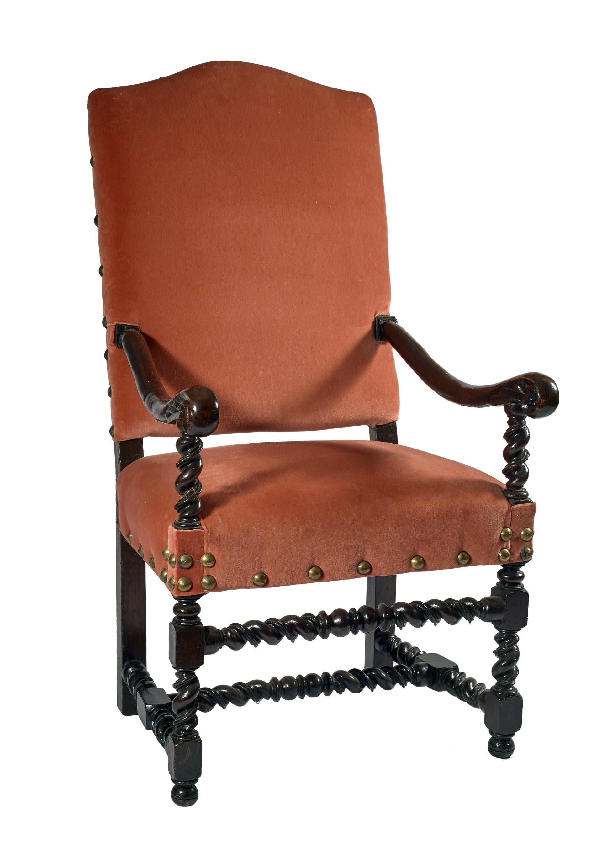 In the 17th century began to build chairs and armchairs in folders with some enrichment as the front legs and supports for the shaped or turned armrests. 

The carving of the wood and the folders becomes more vigorous than curls or scrolls and