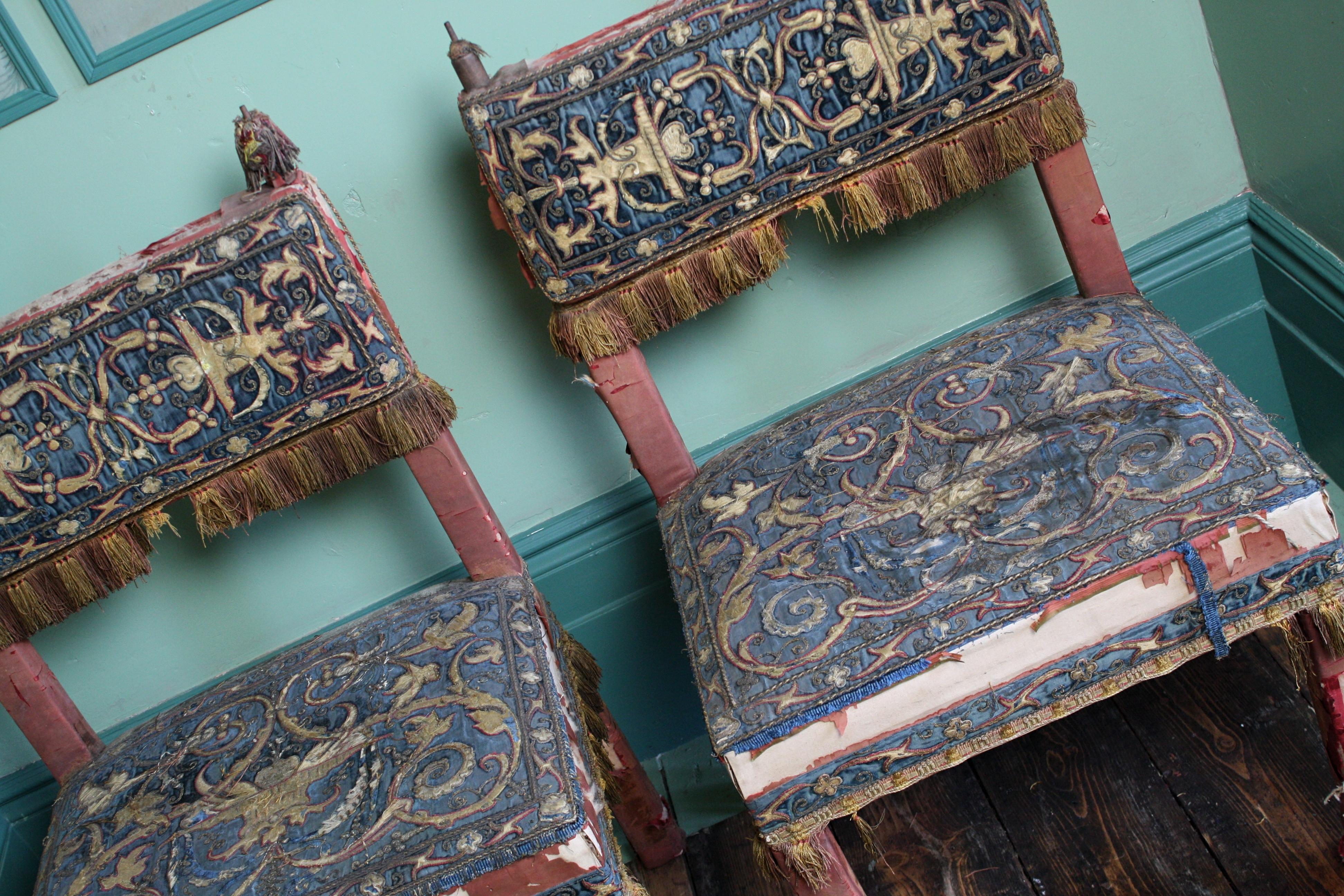 Worn and wonderfully, a sculptural pair of totally unrestored 17th century style chairs, upholstered in silk and wire work floral scrolls by George Trollope & Son 

These chairs would prefer an easy life in their current condition, structurally