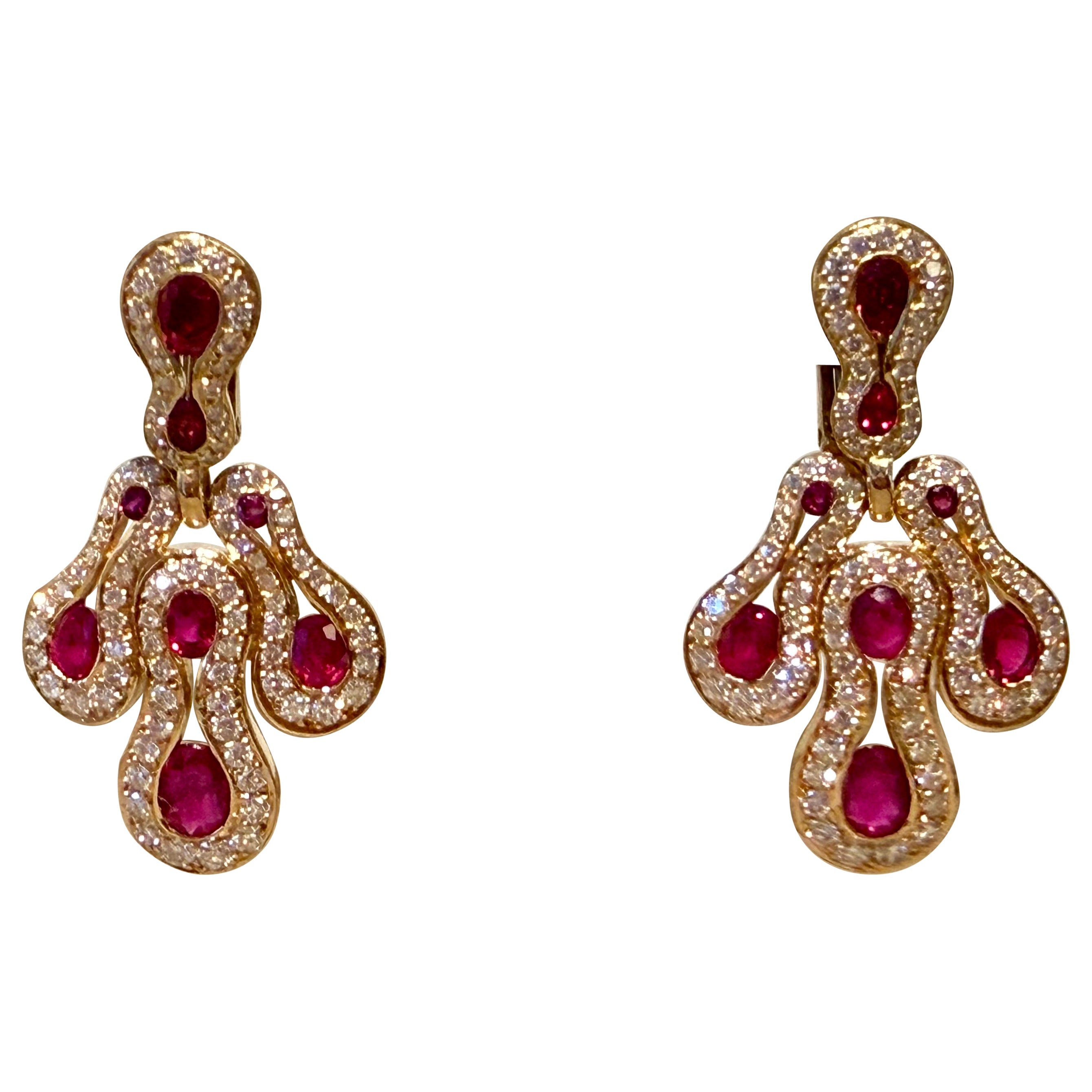 Pair of 18 K yellow Gold 1980s Vintage Ruby Diamond dangle Eearrings For Sale