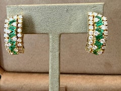 Pair of 18 K yellow Gold Diamond Emerald earclips by Damiani