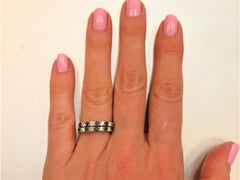 Pair of 18 Karat Gold Sapphire and Diamond and Emerald and Diamond Band Rings