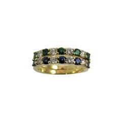 Retro Pair of 18 Karat Gold Sapphire and Diamond and Emerald and Diamond Band Rings