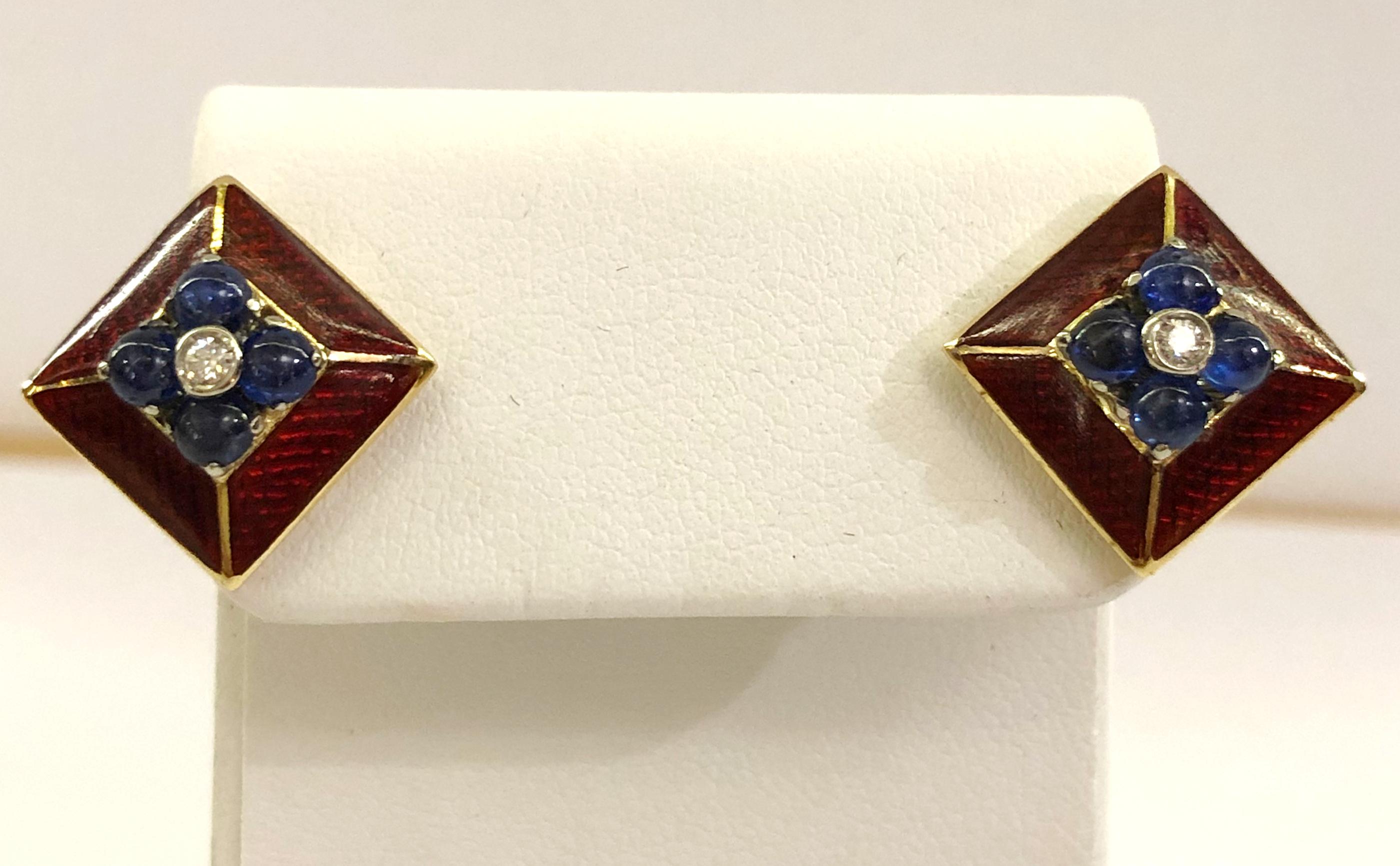 Pair of vintage earrings with 18 karat yellow gold, burgundy enamel, Cabochon sapphires, and brilliant central diamonds, Italy 1960s
Diameter 1.5cm
