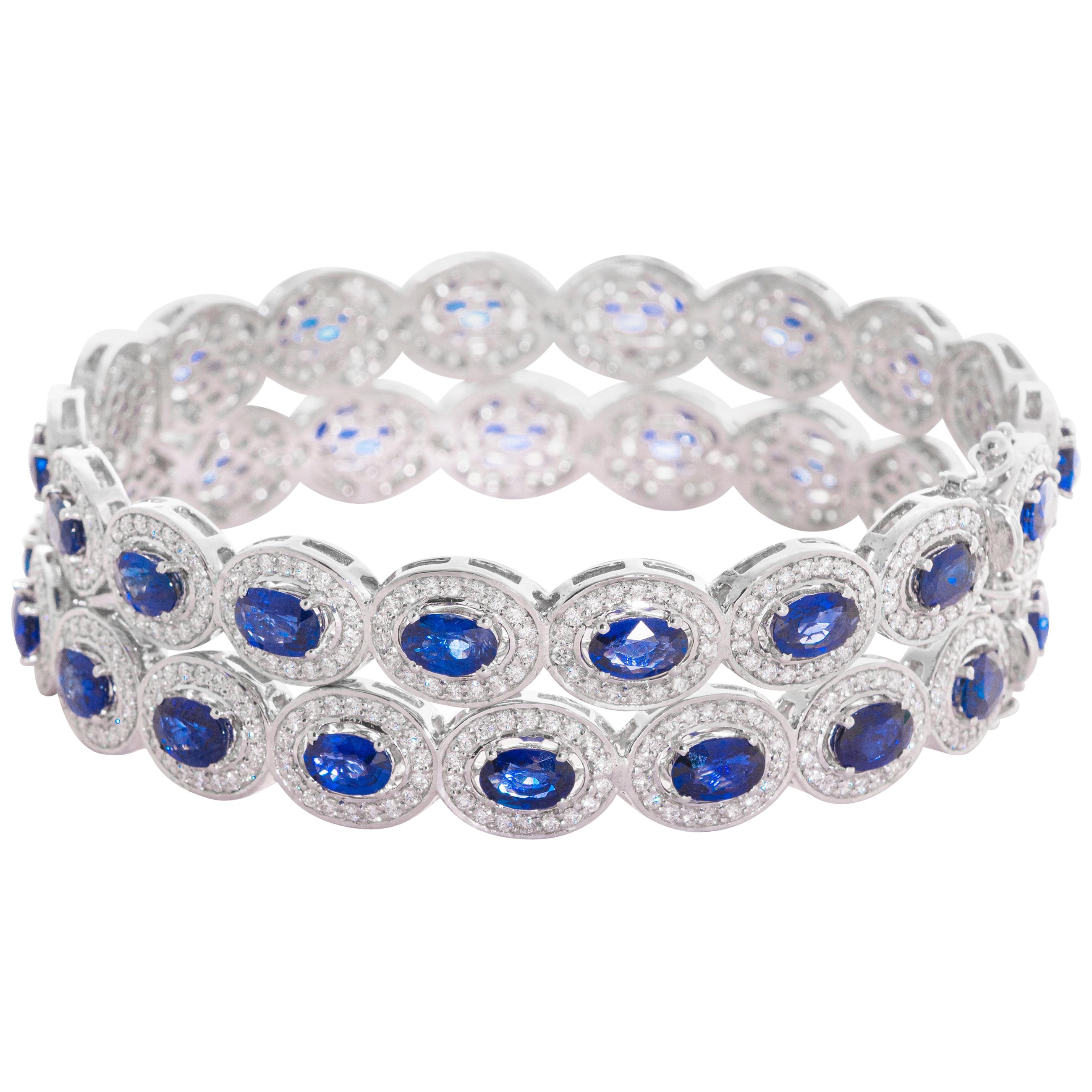 Pair of 18 Karat White Gold Blue Sapphire Diamond Bangle Bracelets For Sale