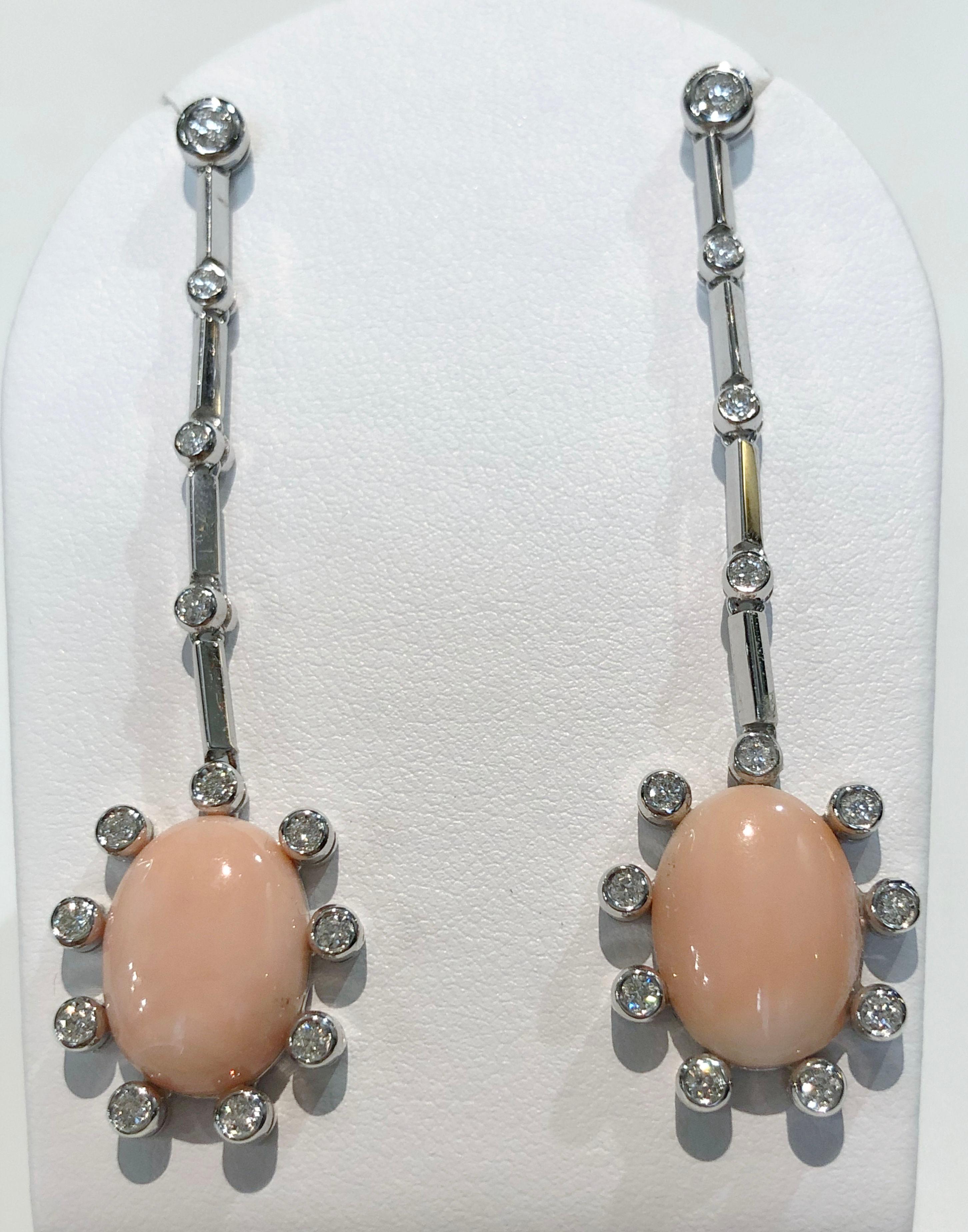 Pair of vintage earrings with 18 karat white gold and angel skin corals, Italy 1950s
Length 7 cm