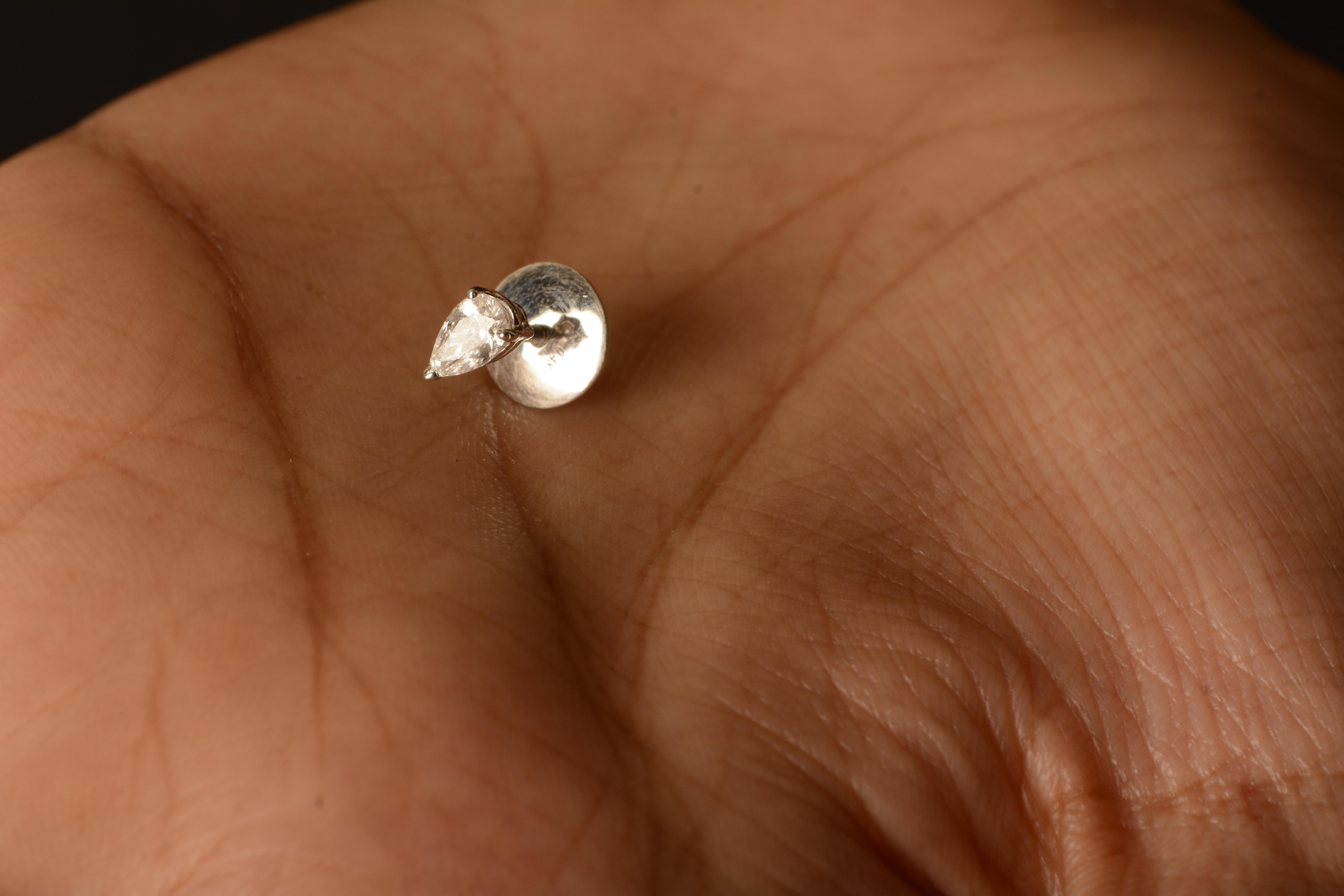 Women's Pair of 18 Karat White Gold Pear Shape Diamond Earstuds For Sale