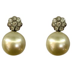 Retro Pair of 18 Karat White Gold Pearl and Diamond Earrings