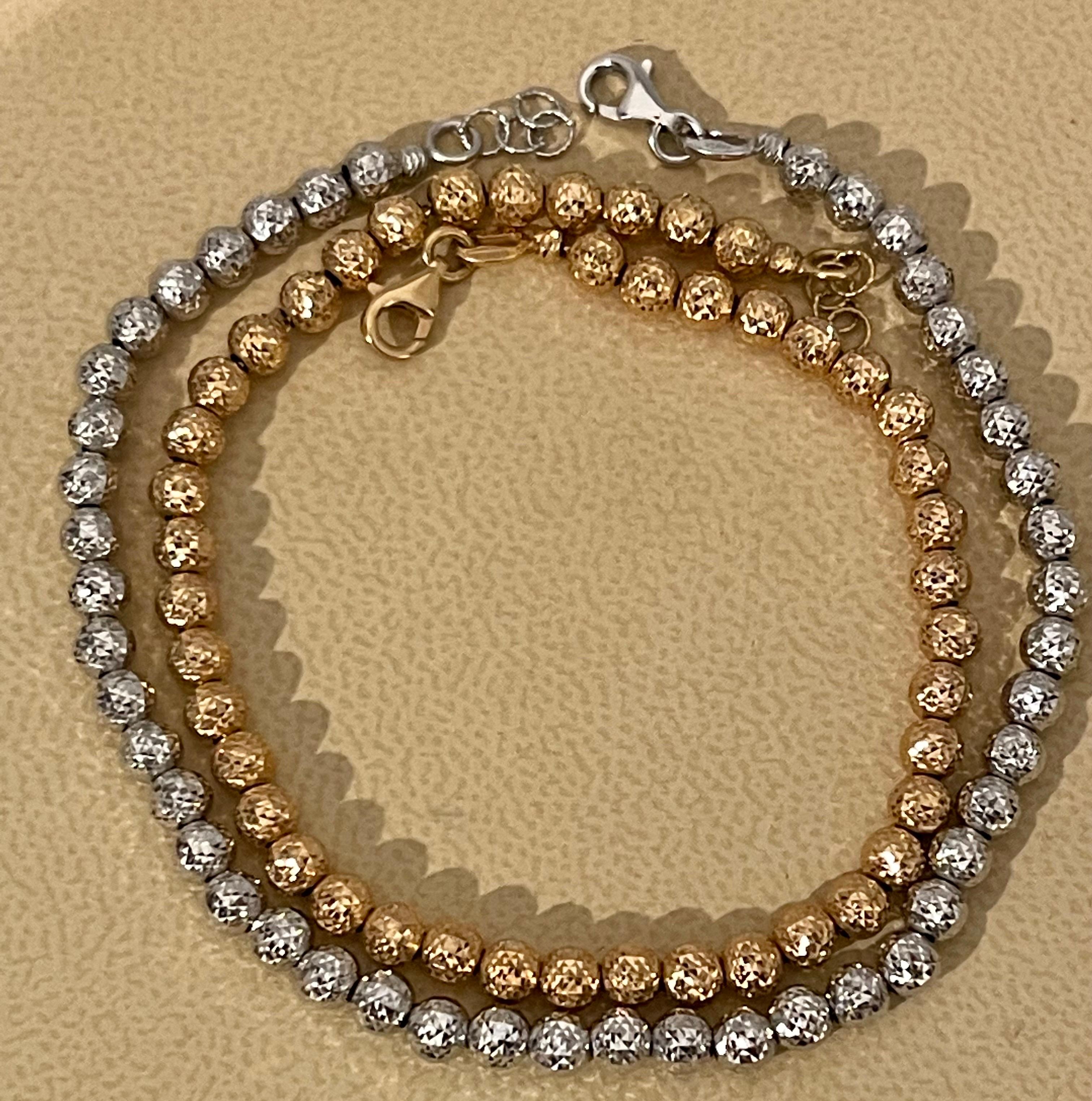 Pair of 18 Karat White Gold/ Rose Gold Ball Bracelets, 8.2 Gm In Excellent Condition For Sale In New York, NY