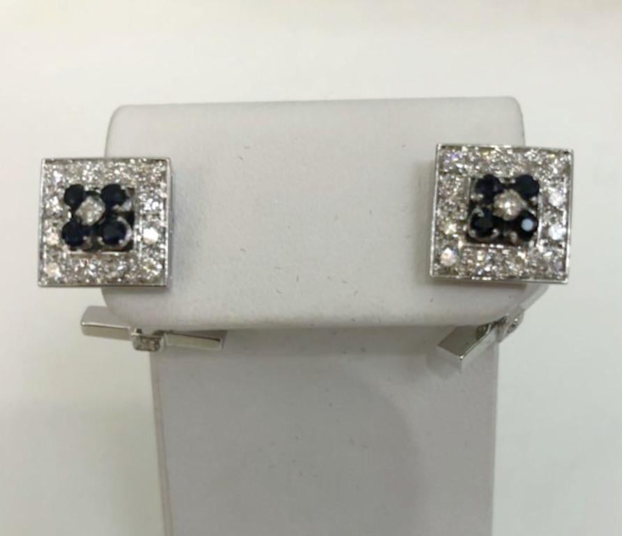 Pair of vintage 18 karat white gold cufflinks with carre diamonds and round sapphires / Italy 1960-1970s
Width 0.8cm