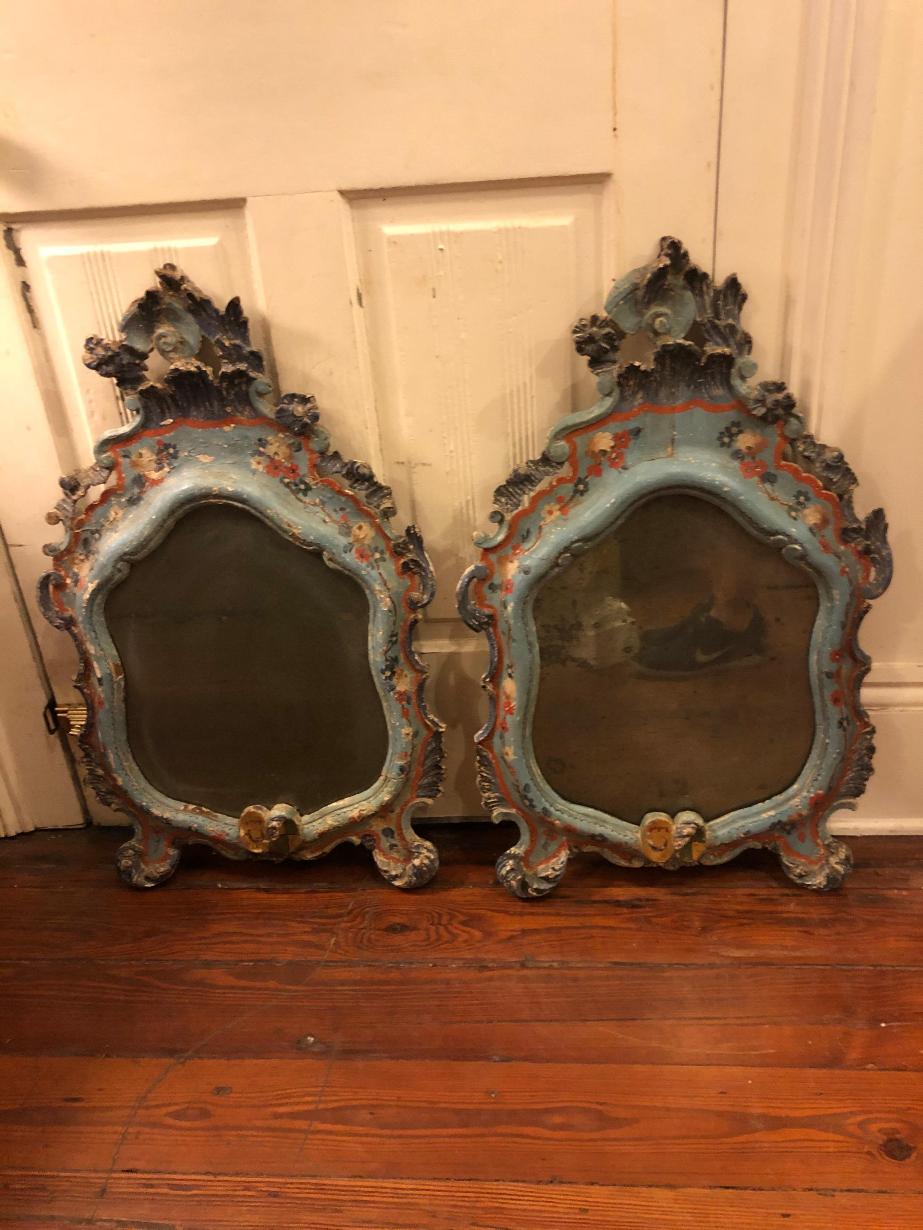True pair of Venetian painted mirrors. Extremely dark original plates and original paint.
