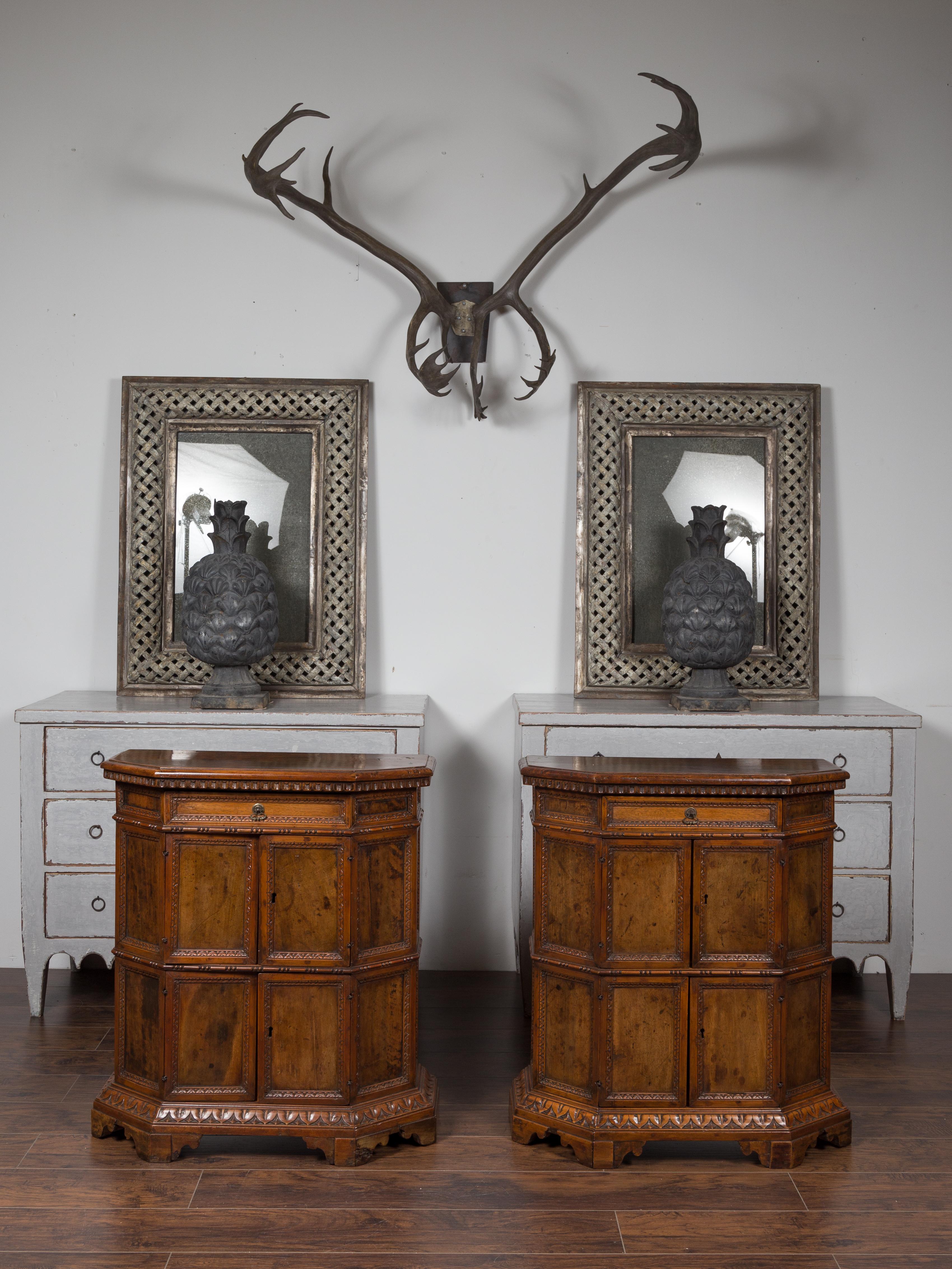 Pair of 1800s Italian Carved Walnut Cabinets with Canted Sides, Drawer and Doors In Good Condition For Sale In Atlanta, GA