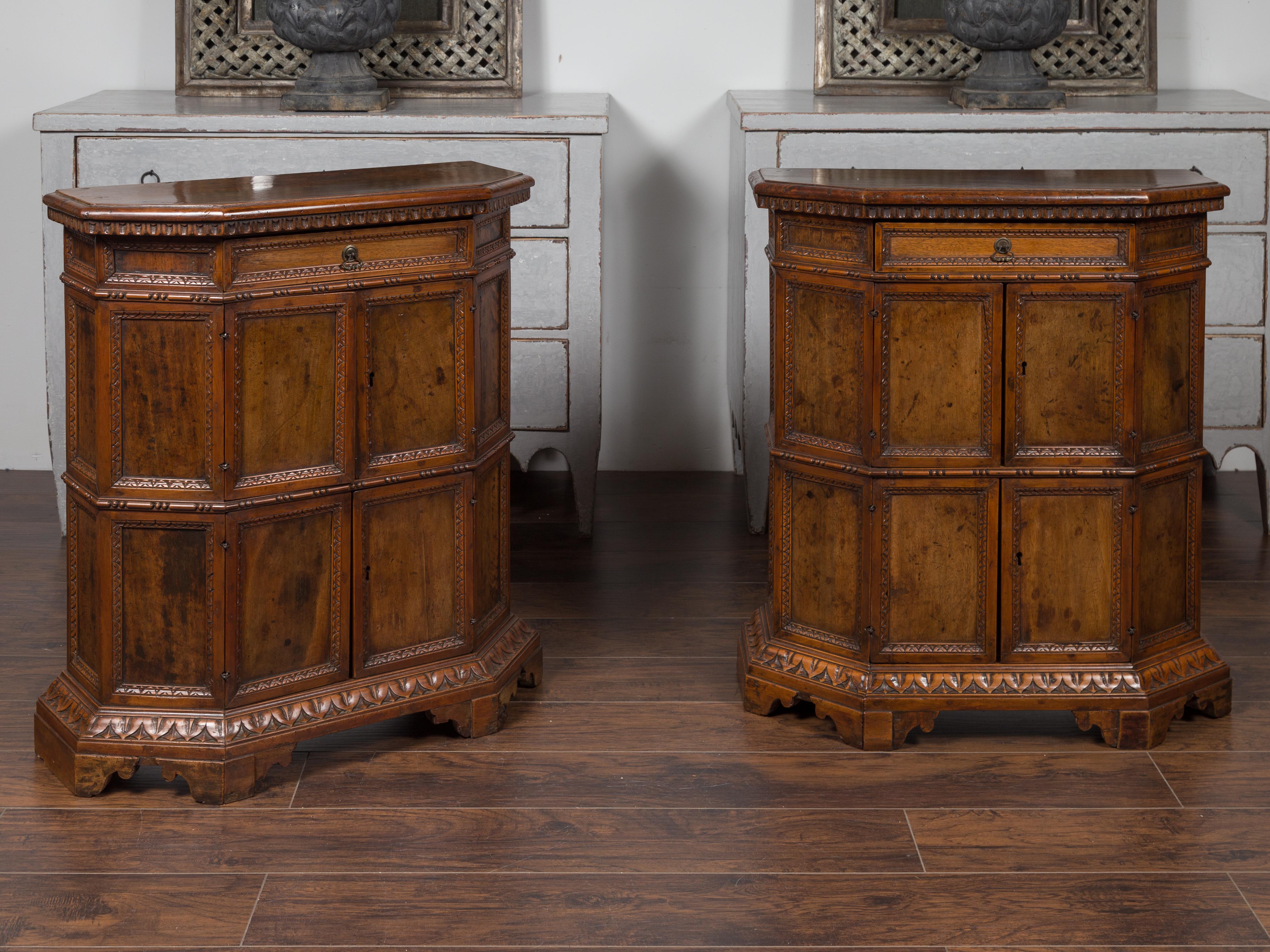 19th Century Pair of 1800s Italian Carved Walnut Cabinets with Canted Sides, Drawer and Doors For Sale