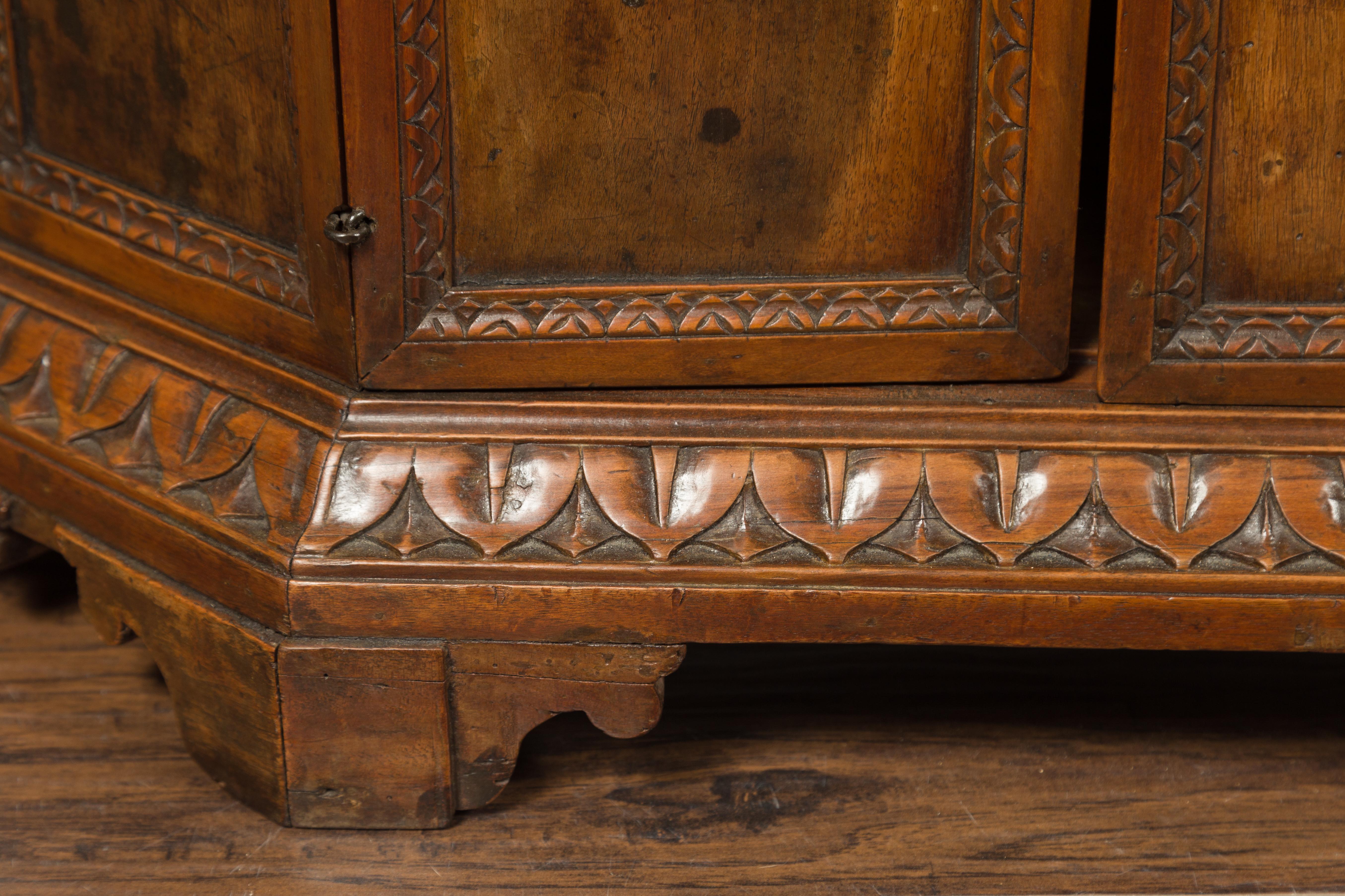 Pair of 1800s Italian Carved Walnut Cabinets with Canted Sides, Drawer and Doors For Sale 4