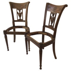 Coppia di poltrone in legno stile impero francese del 1850