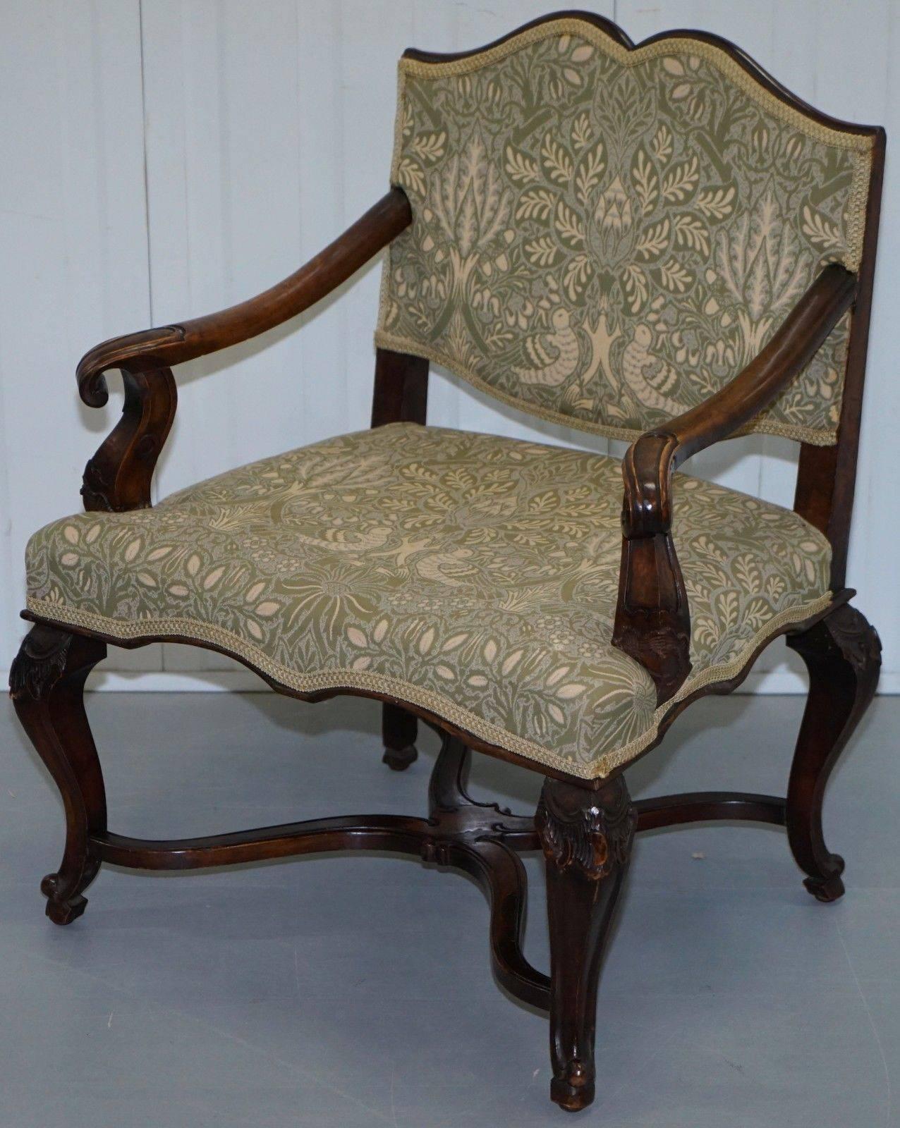 We are delighted to offer for sale this stunning pair of Northern Italian Walnut framed with William Morris / Liberty’s of London upholstery

A very rare and good looking pair of Italian armchairs with beautiful sculptural lines all over, the